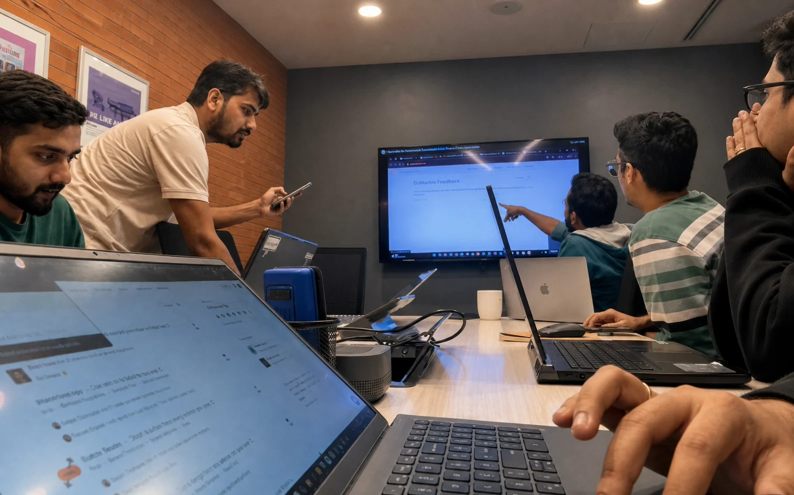 The GoMarble team working together on Product Hunt launch day