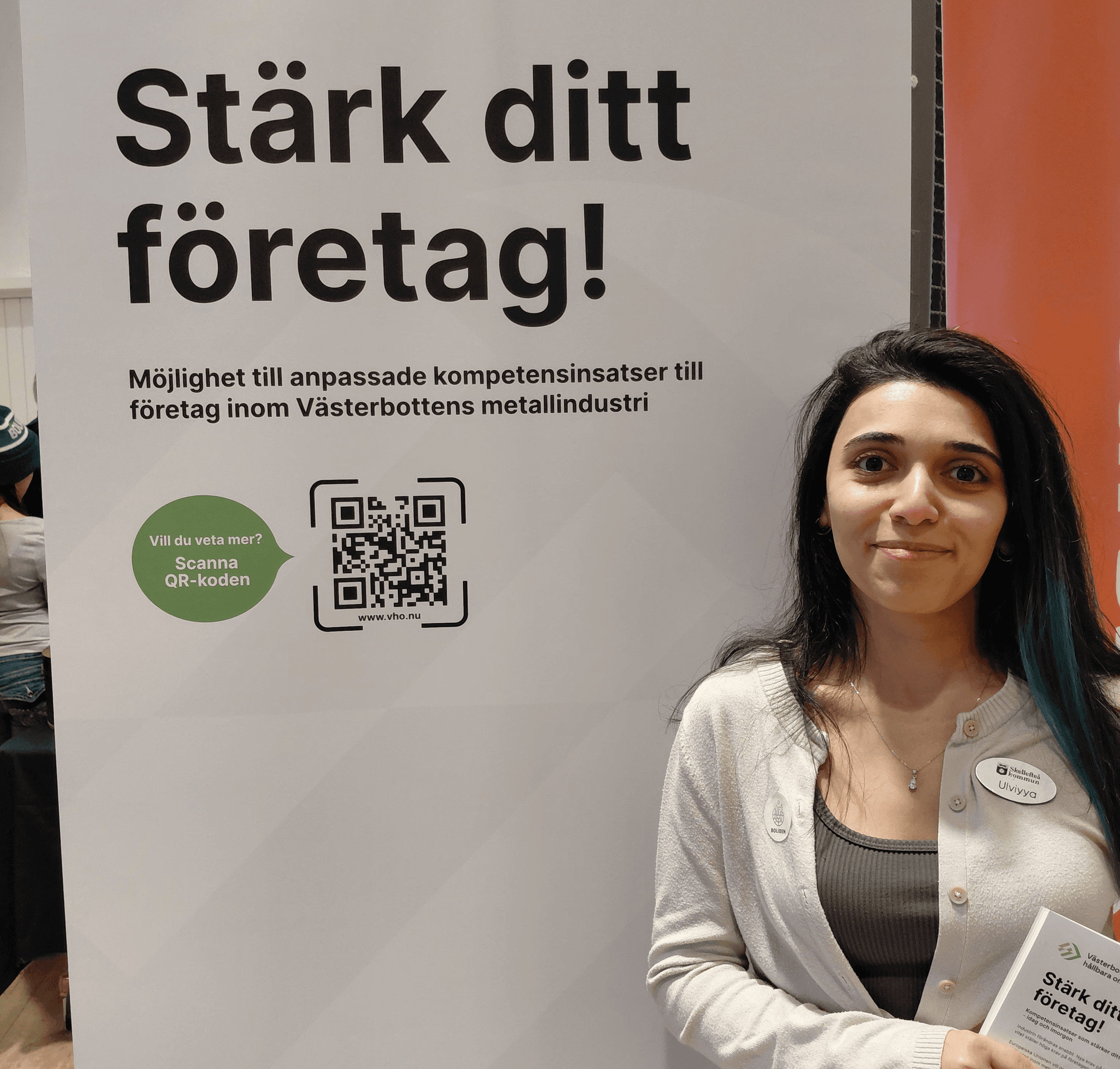 Two business partners shaking hands in agreement.