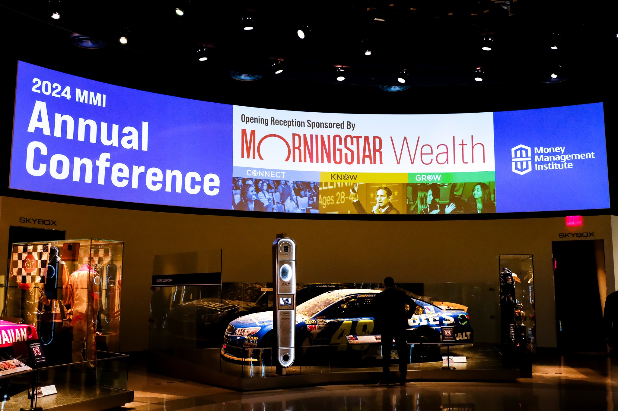 2024 MMI Annual Conference thumbnail showing a large digital screen at the NASCAR Hall of Fame