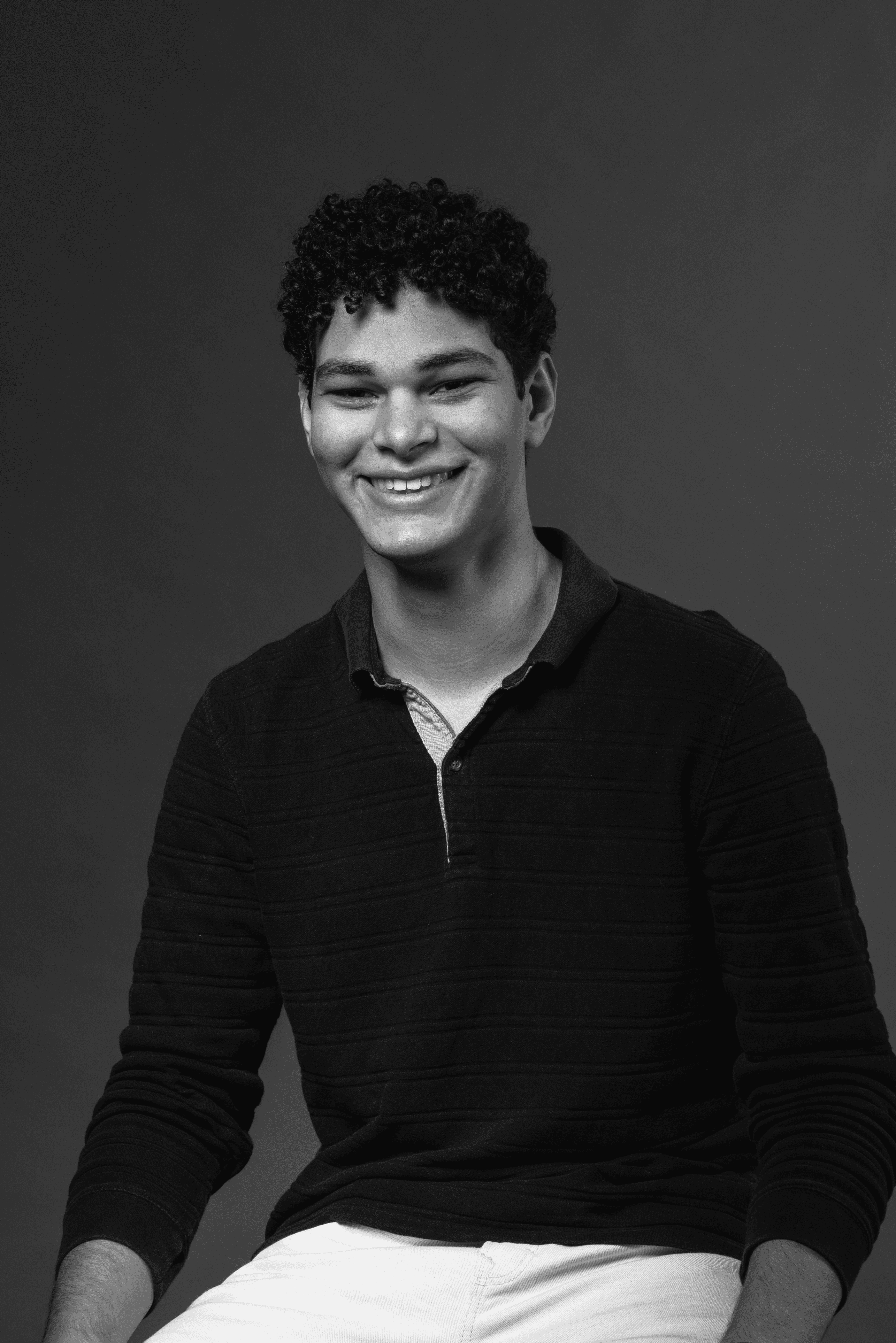 a blurry photo of a person standing in front of a wall