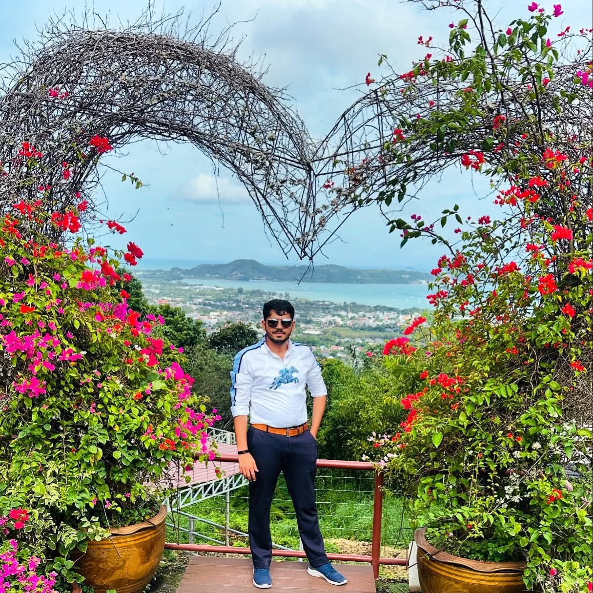 A cartoon character wearing a blue shirt and a blue hat