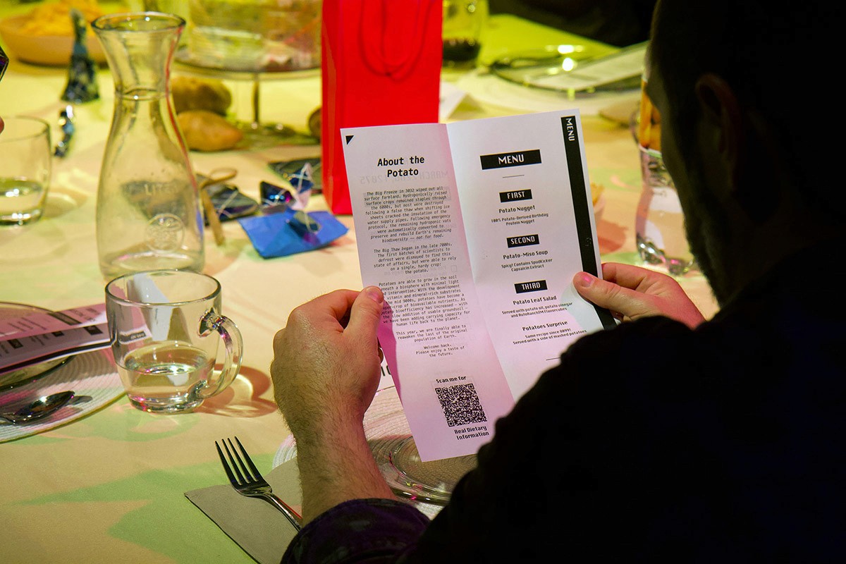 A guest reads a menu.