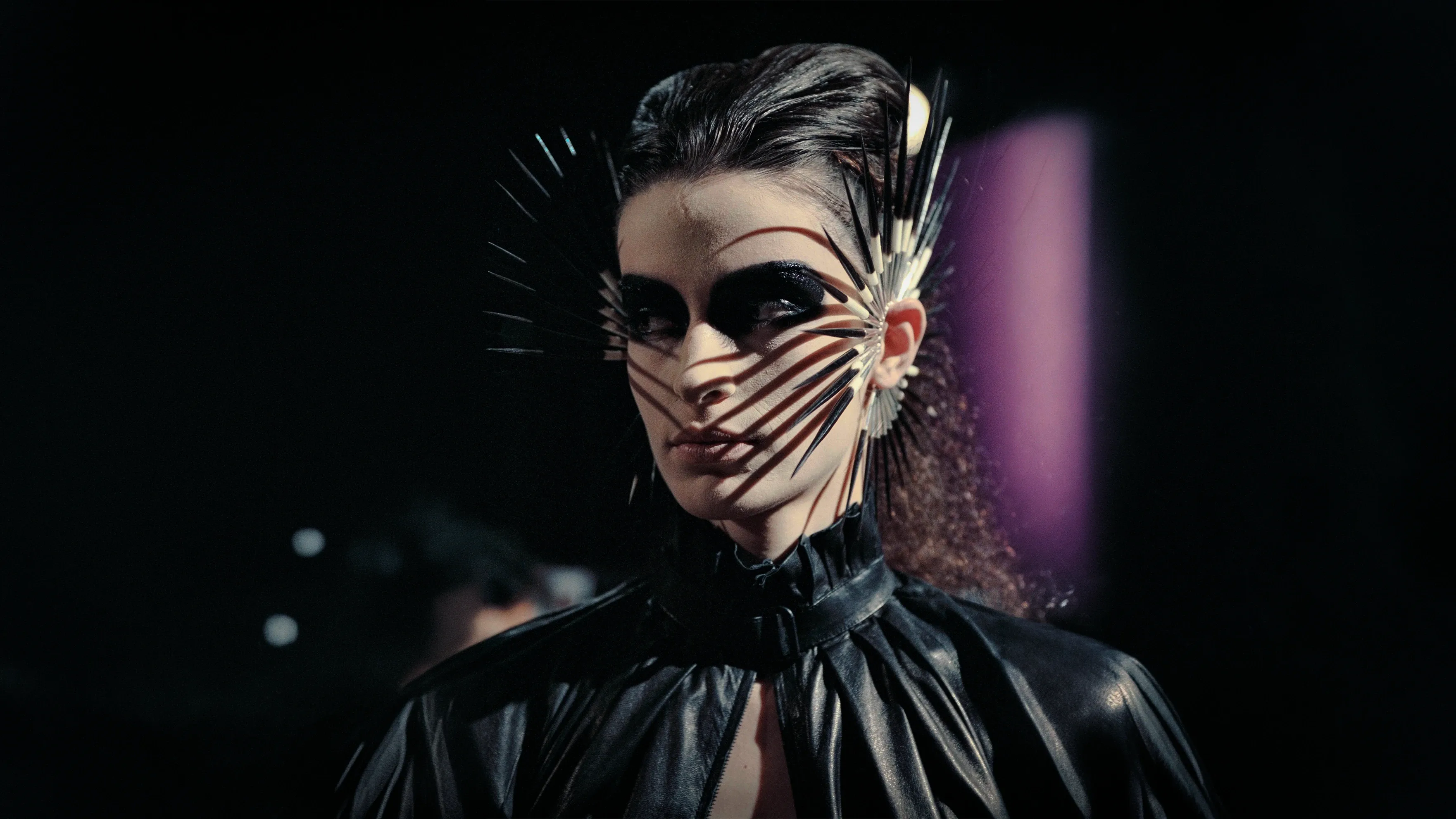 These striking silver quill earrings highlight designer Shaun Leane’s mastery of sharp, organic forms that defined early 2000s avant-garde fashion history.