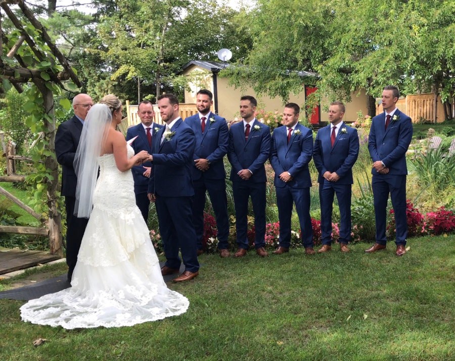 Wedding ceremony set against a natural Ontario backdrop