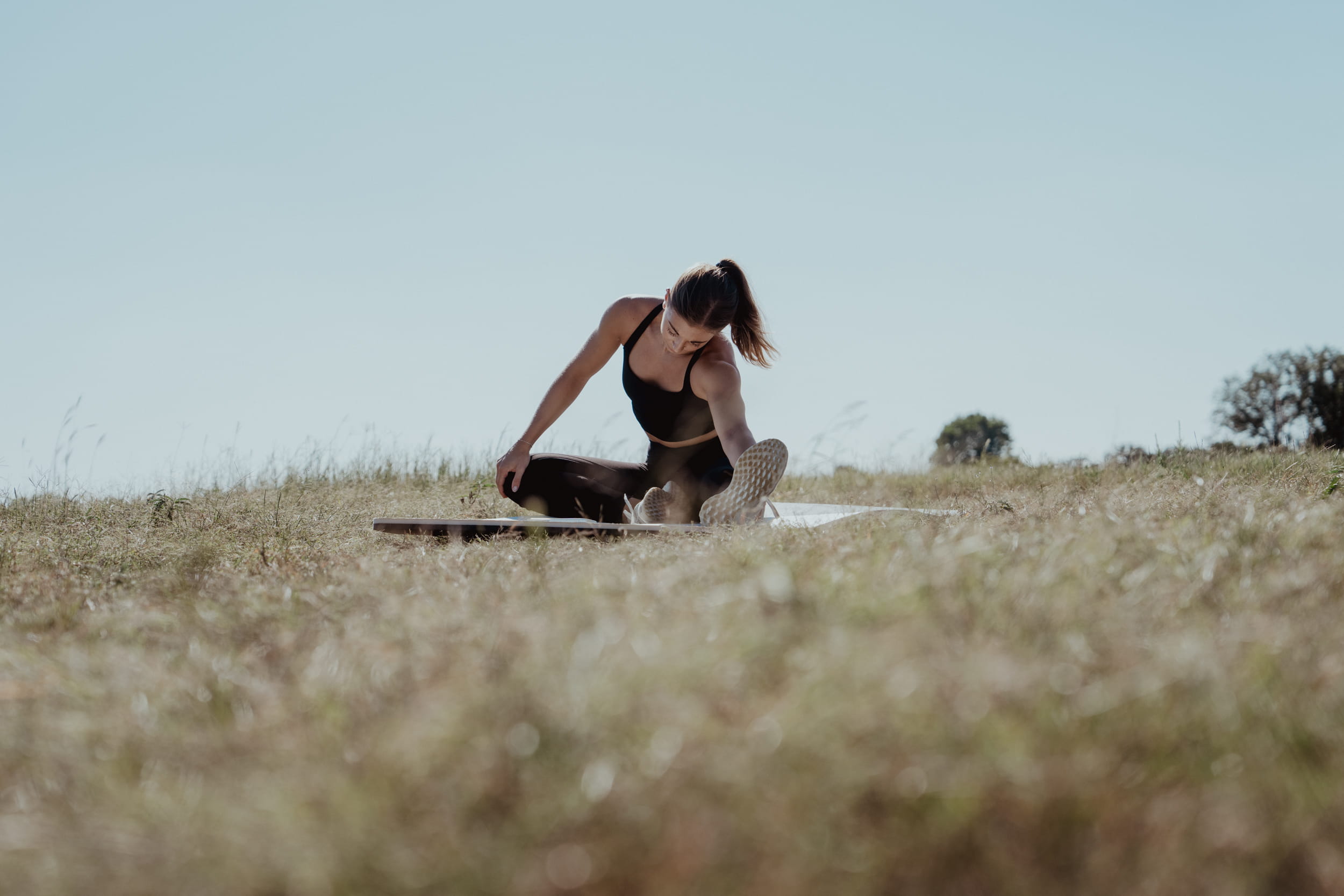 woman worried about her leg - What Causes Stiffness in Legs