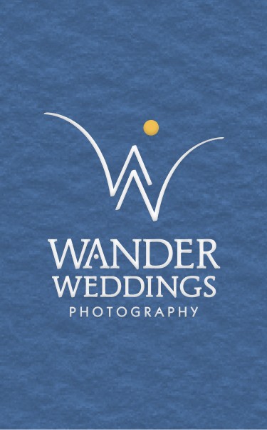 Wander Weddings Photography logo in white and gold on a textured blue background.