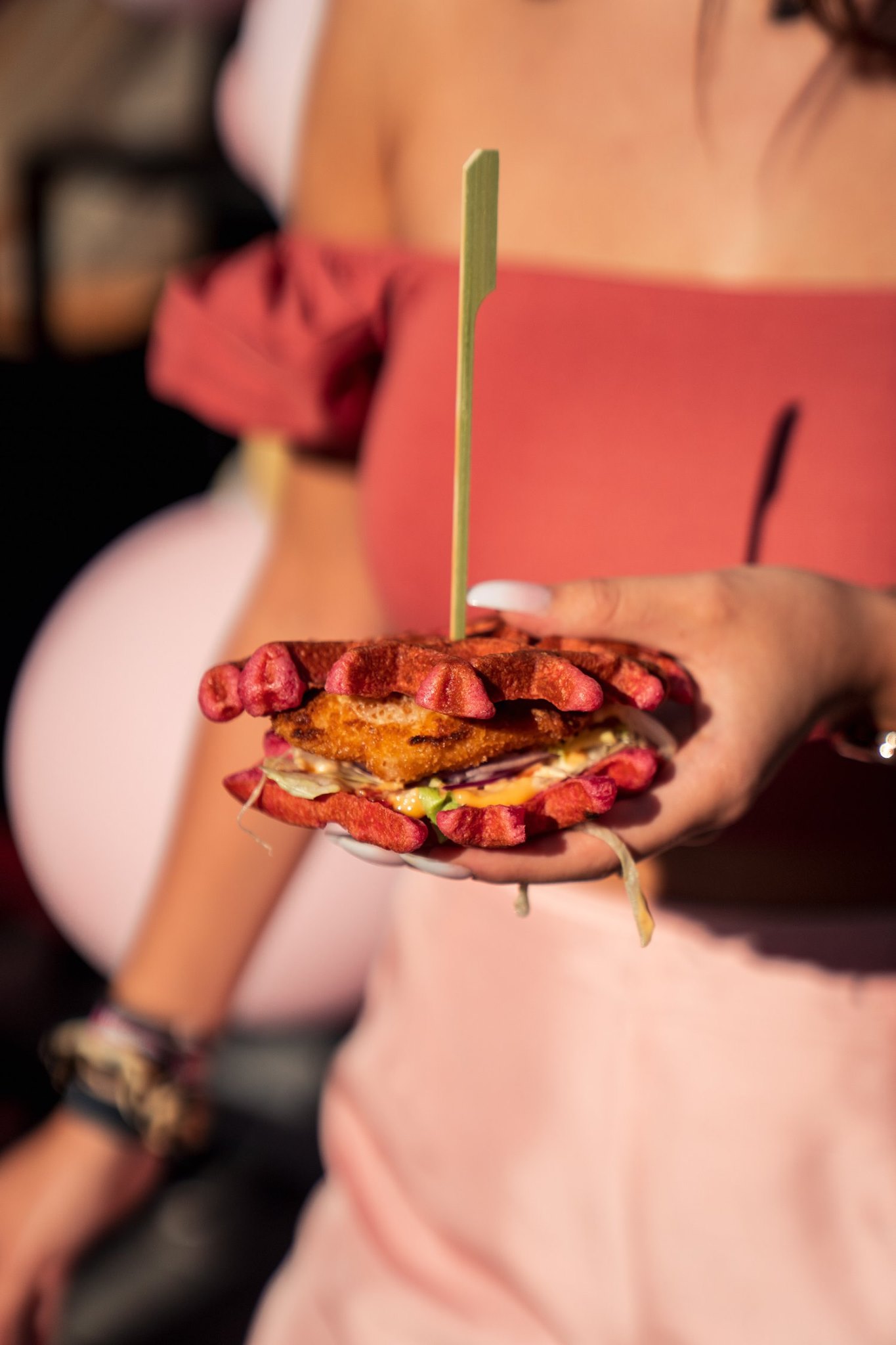 White outline of a classic smiley face followed by the text “Smiley Co” in white serif type on a vivid orange background.