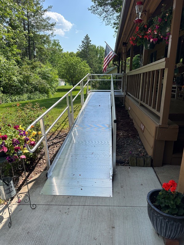 Front porch accessibility handicap silver ramp with railing
