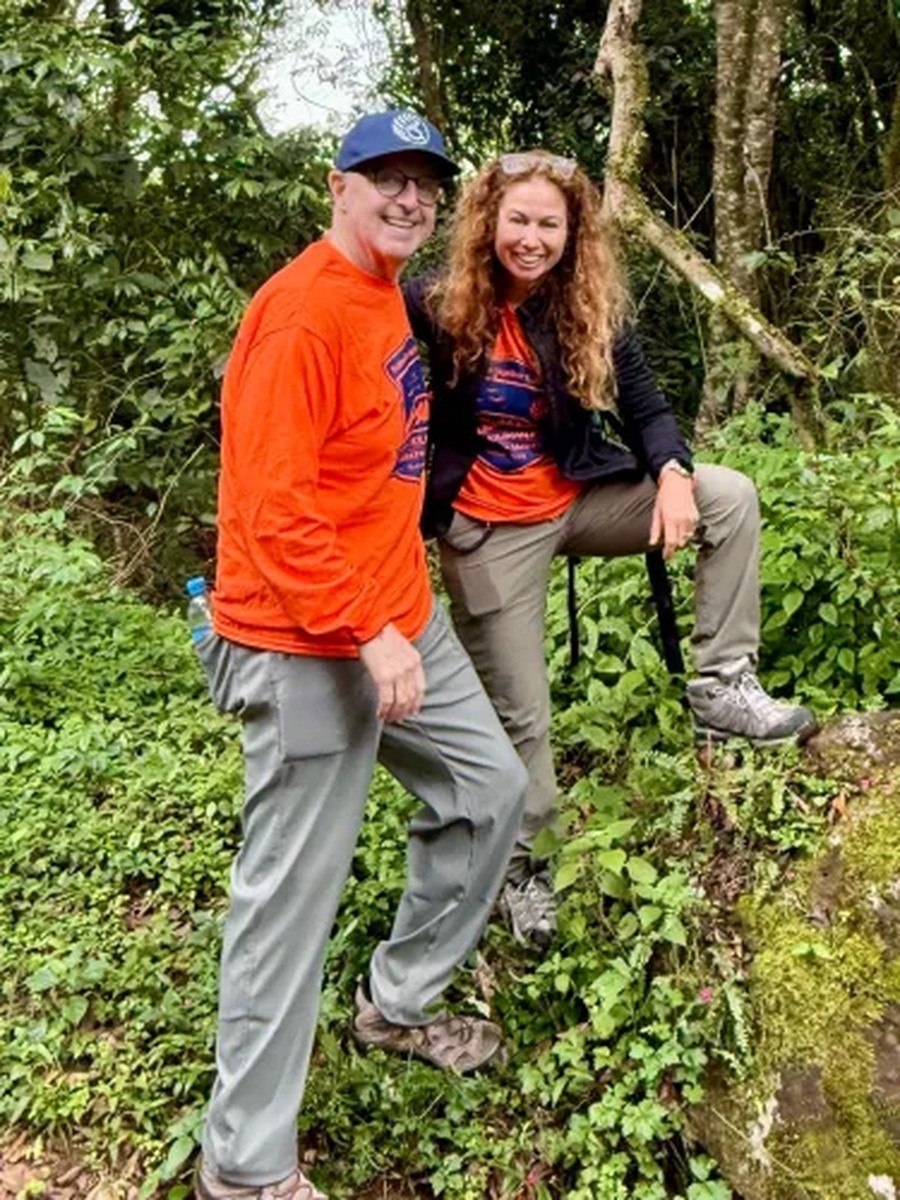 Pamela Becker, founder and CEO of Jeremy’s Circle, and Jamie Lassner, executive director of Accessibility Accelerator, at Marangu Gate ahead of the team’s ascent of Mount Kilimanjaro, July 2026. Photo courtesy of Accessibility Accelerator.