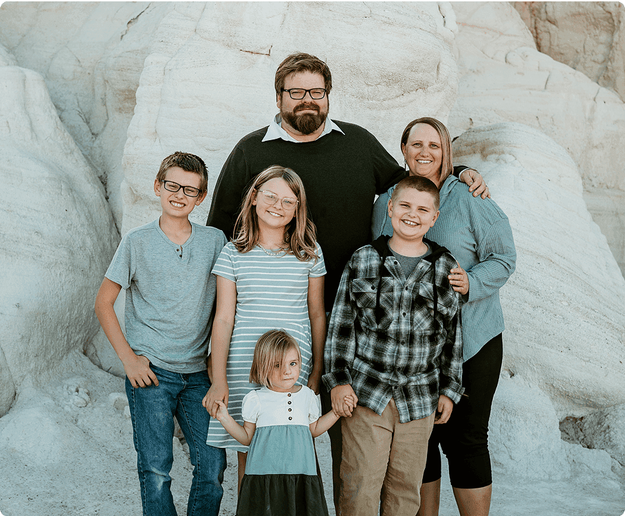 Brian and his family in front of some cool roick formations