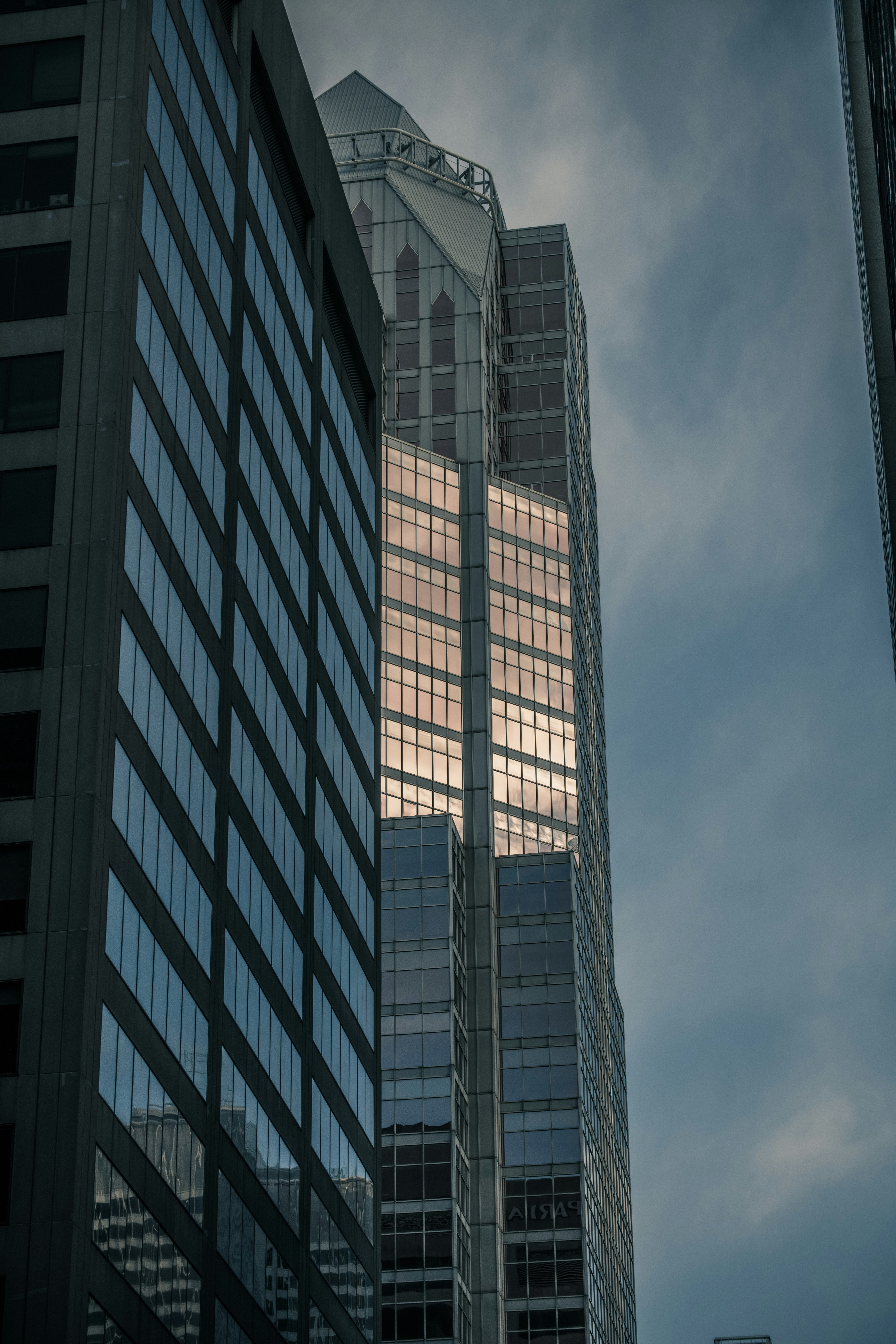 a tall building with glass windows