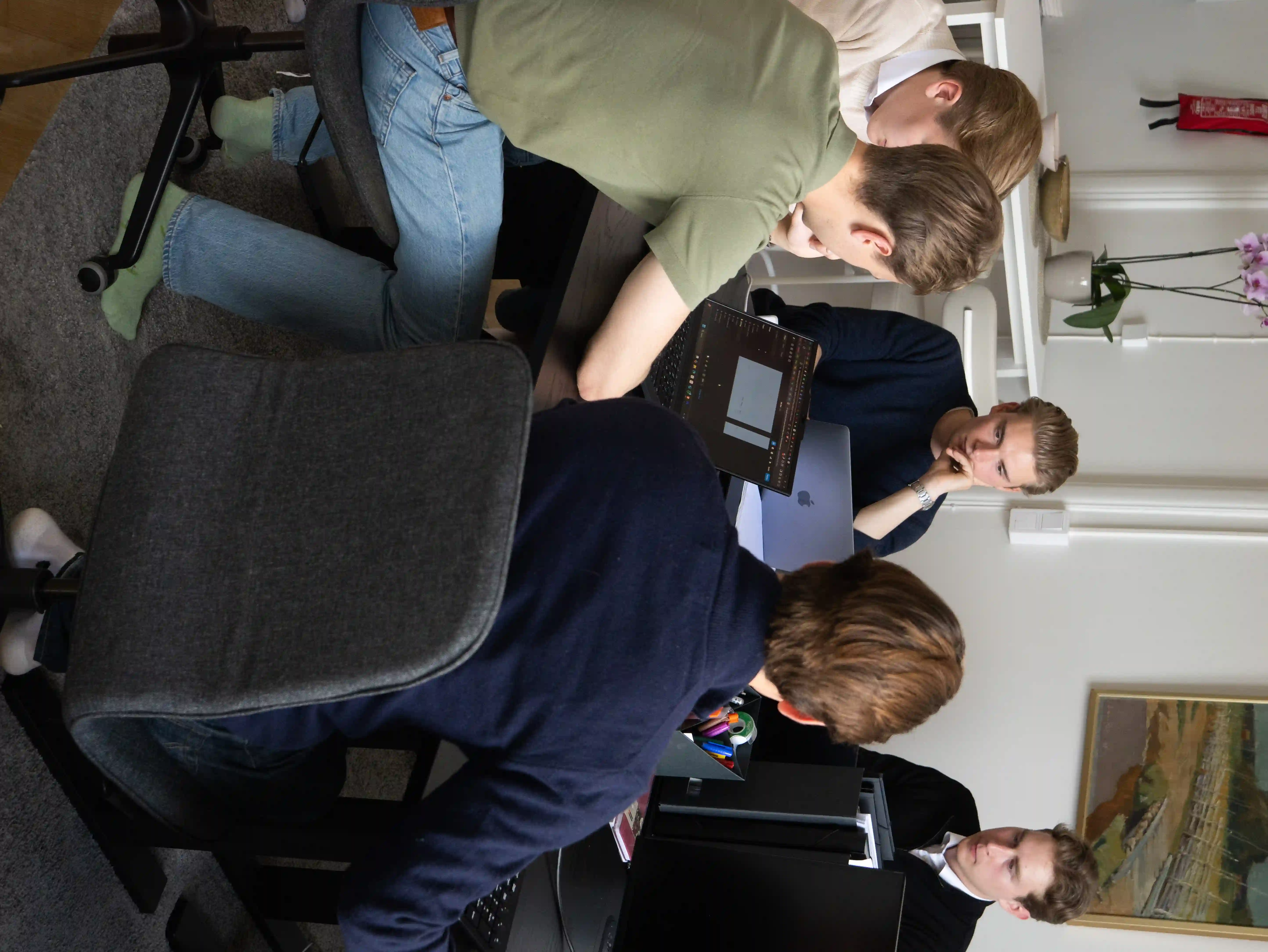 Group of young professionals working in an office