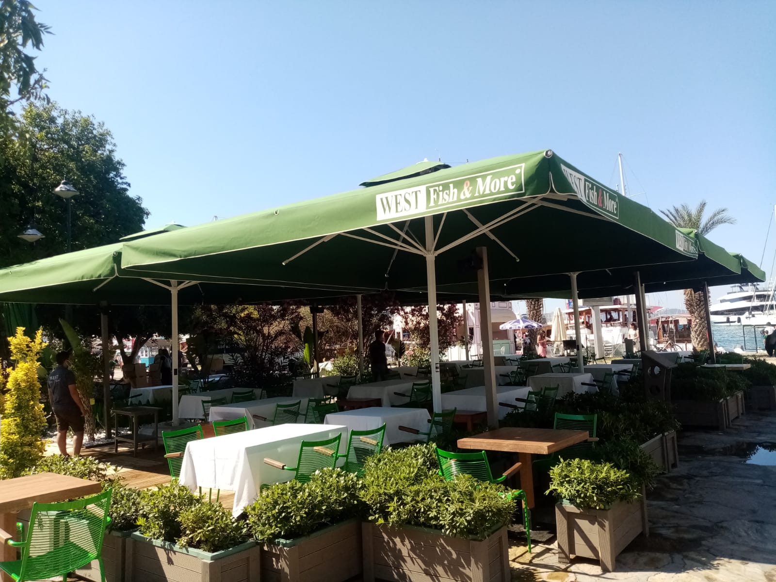 husband and wife working happily on a laptop