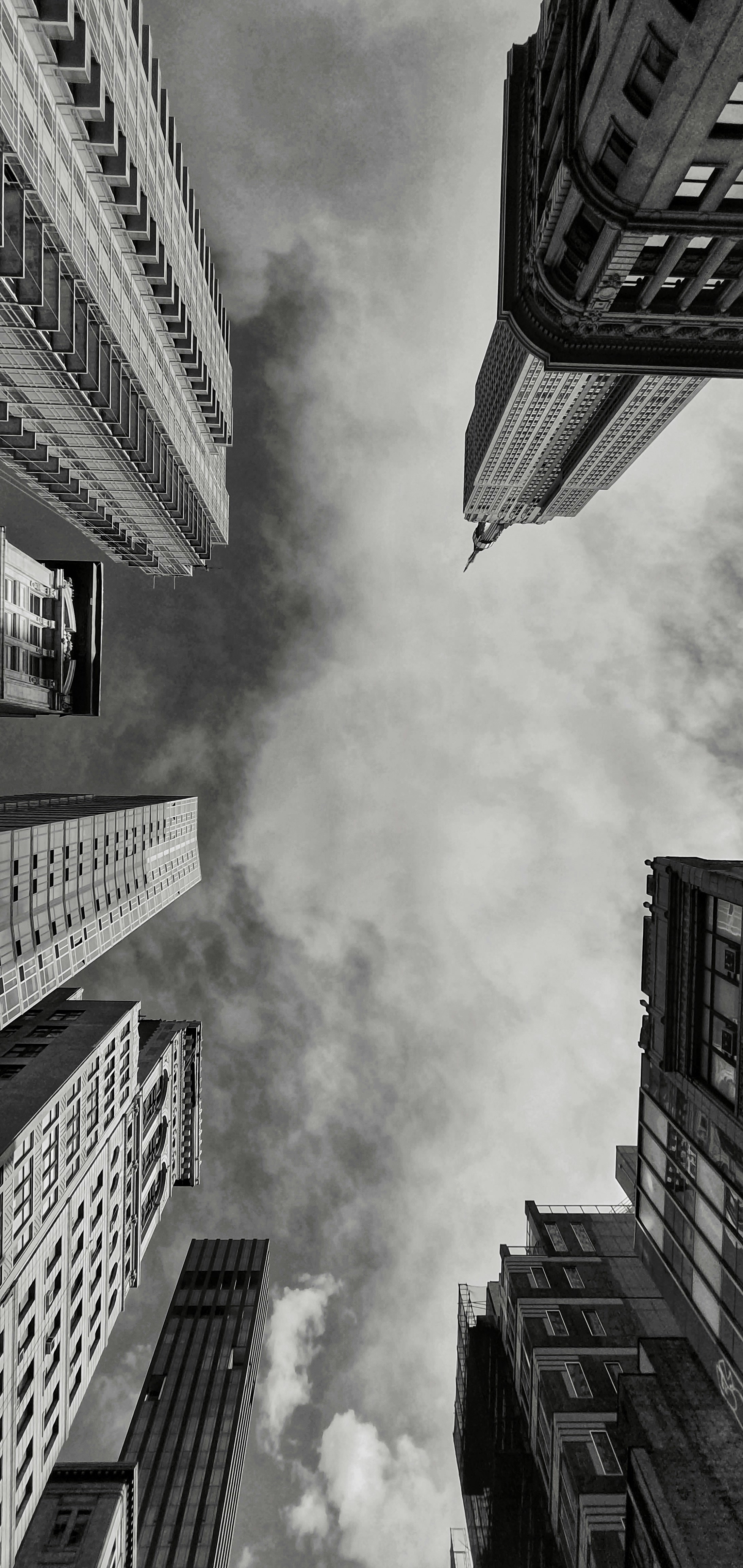 a black and white photo of a snow covered field