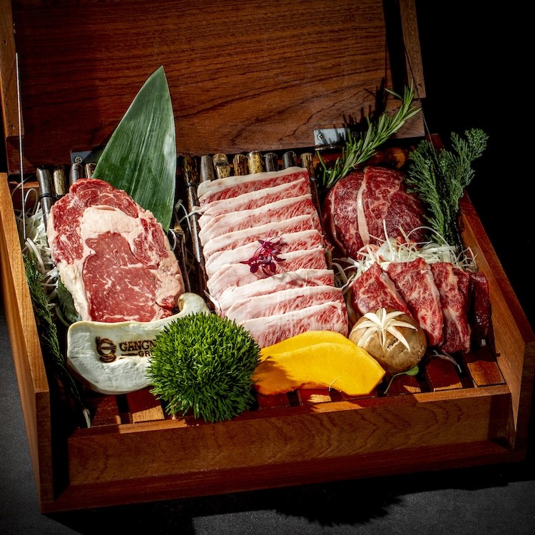 a close up of a steak on a grill