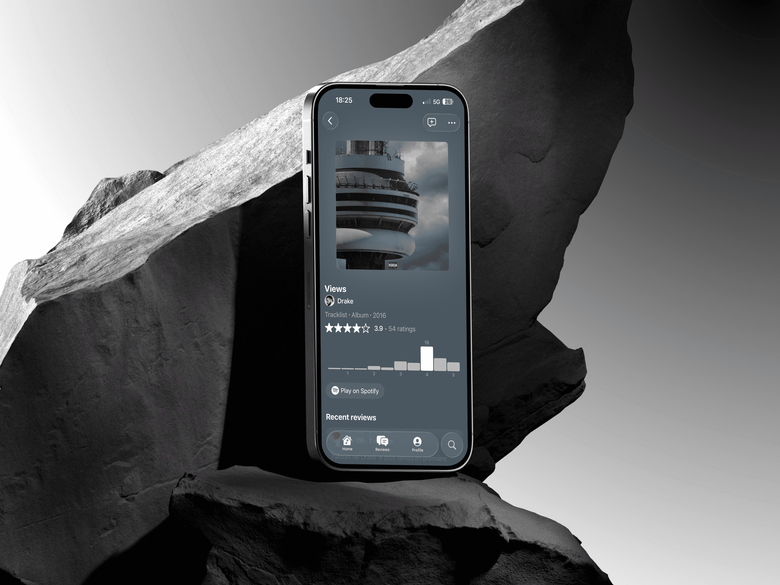 image of a smartphone leaning on top of a record player