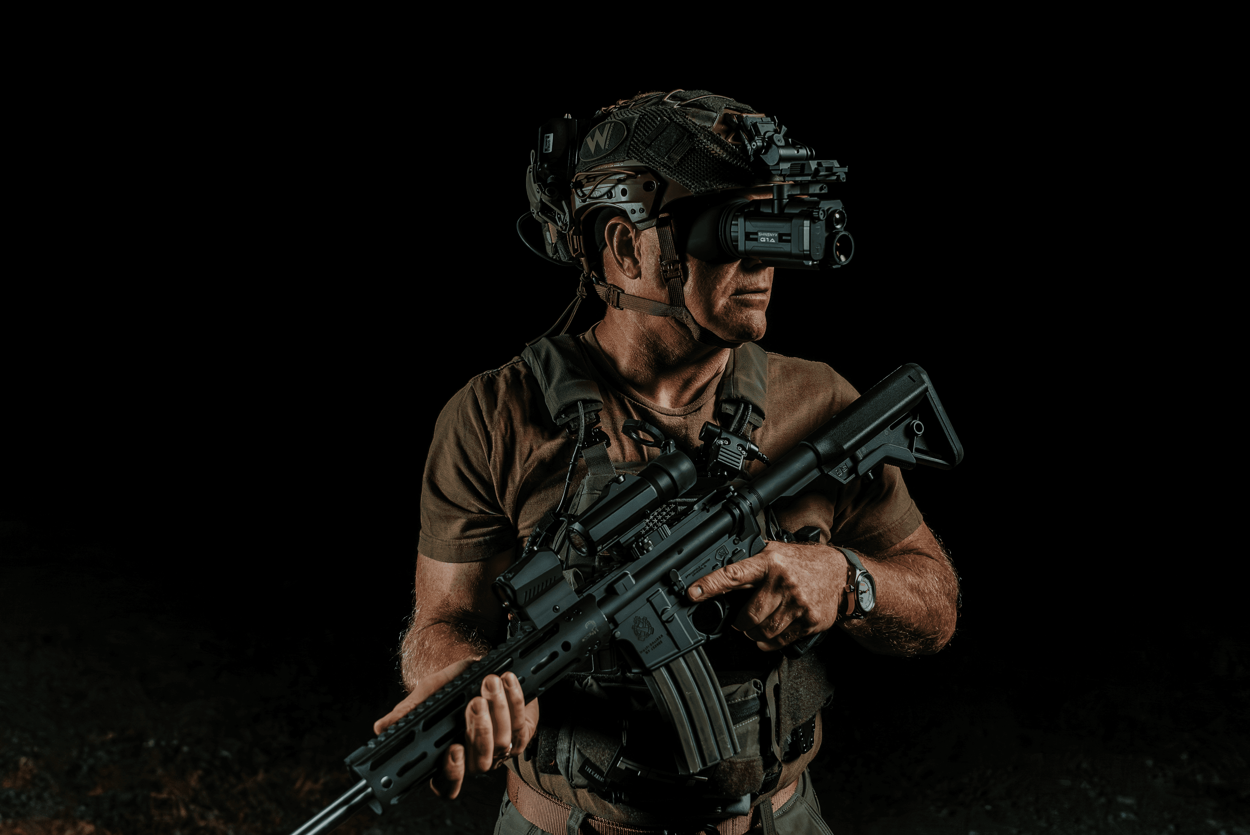 Futuristic black and white concept car with sleek rounded design and city skyline in background.