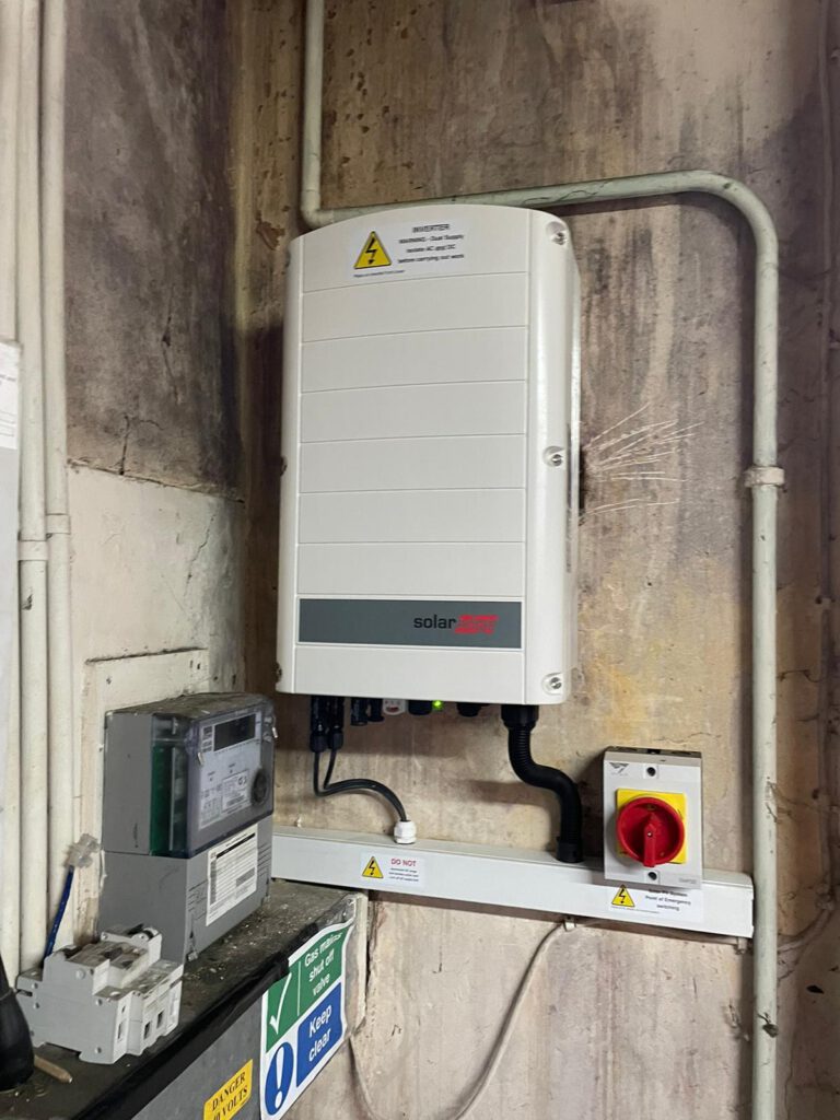Wall-mounted solar inverter and AC isolator switch installed at Ital Cutlery
