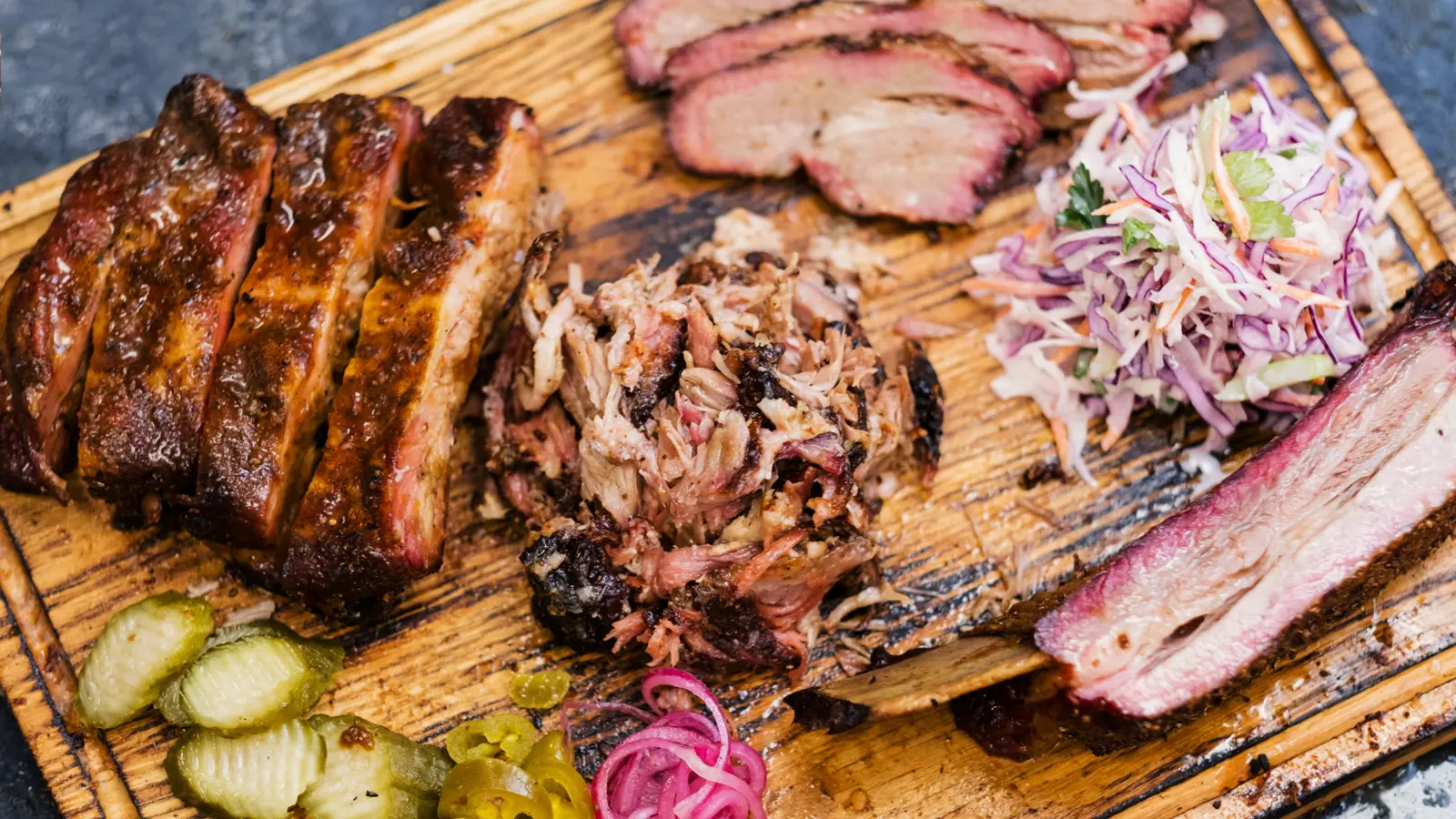 Bowl of tortellini pasta on a decorated table setting