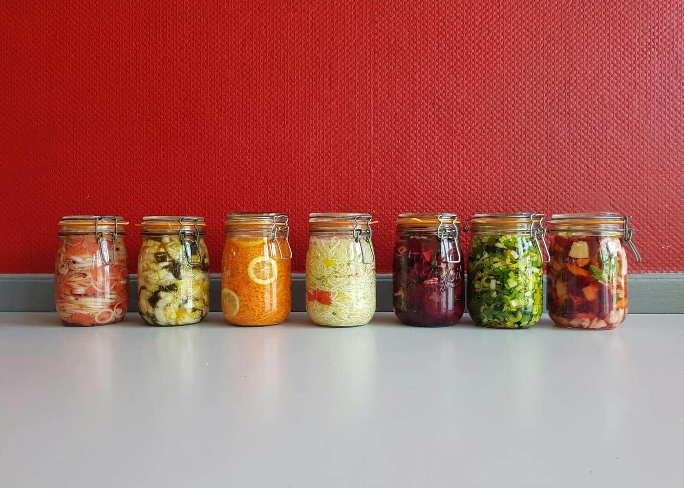 Fermented vegetables in jars designed to support gut microbiome health