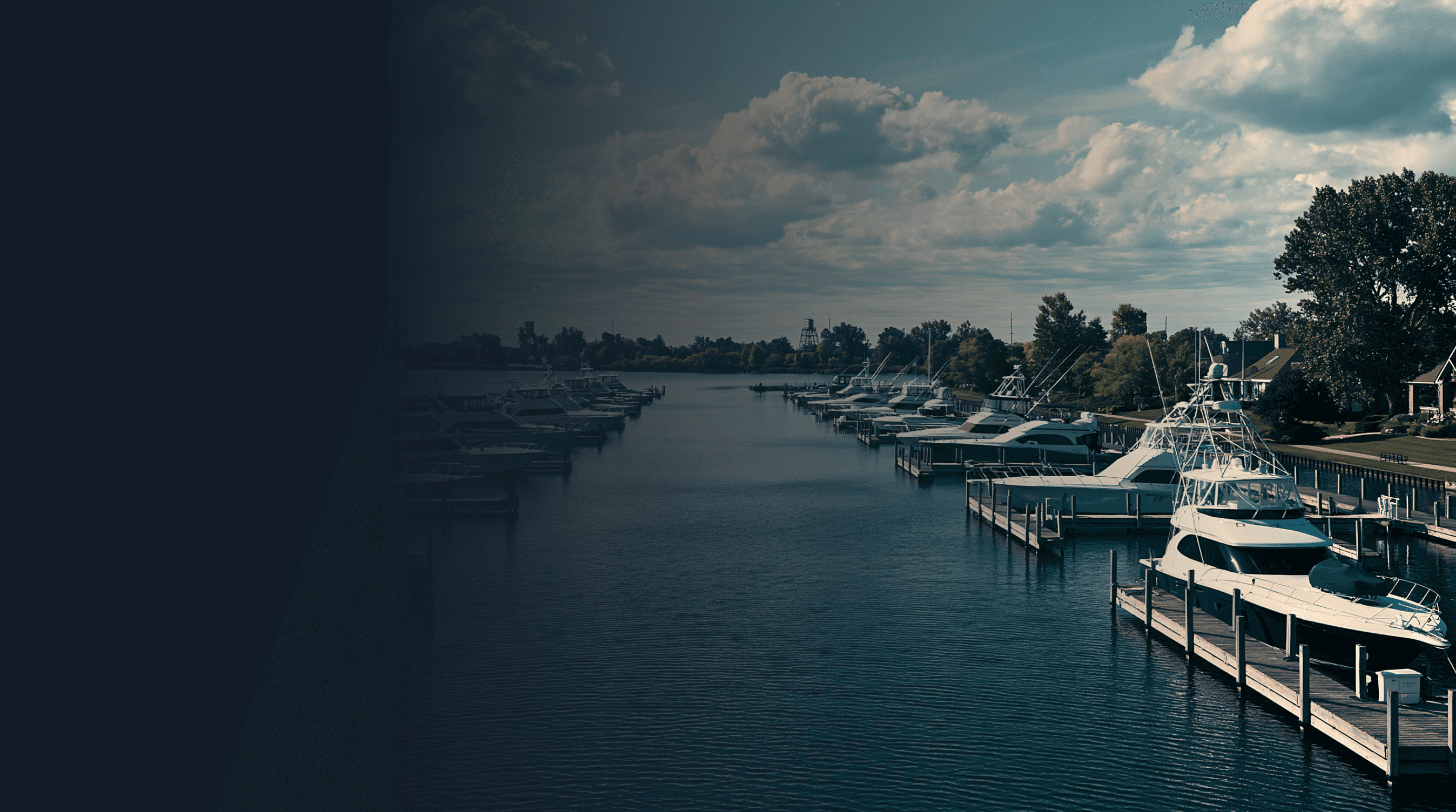 Aerial view of the Detroit River with Detroit skyline at sunset