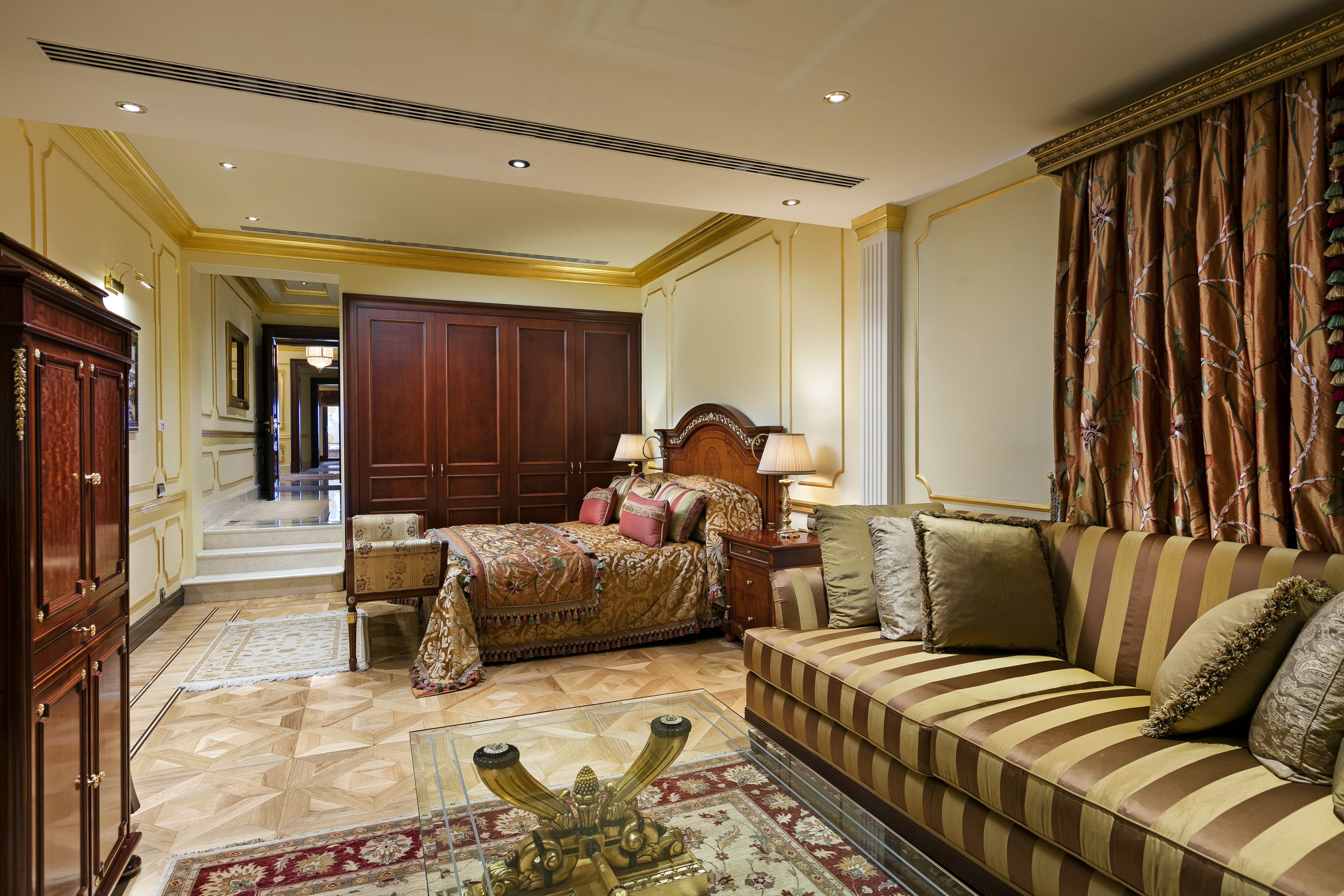 Spacious lounge area with classic details, ideal for relaxation or hosting in-suite moments.
