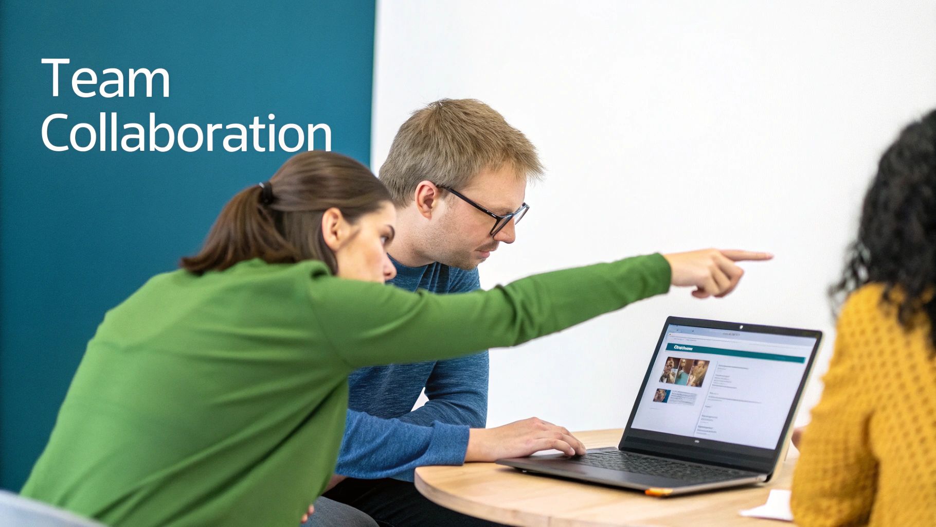 Three diverse colleagues collaborating on a laptop, pointing at the screen with 'Team Collaboration' text.