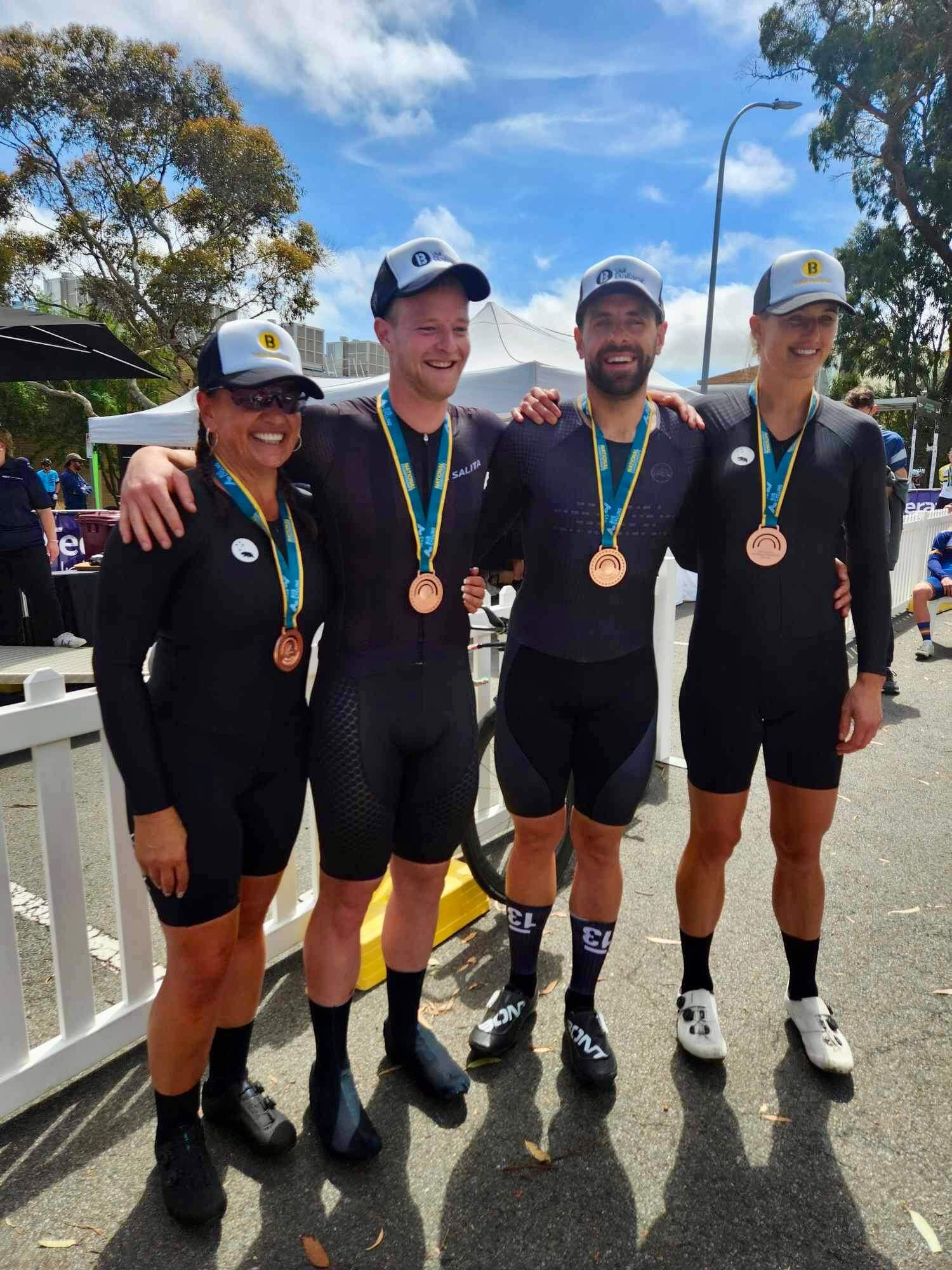 Lily and Jay posing with mens silver medalists at nationals in Ballarat