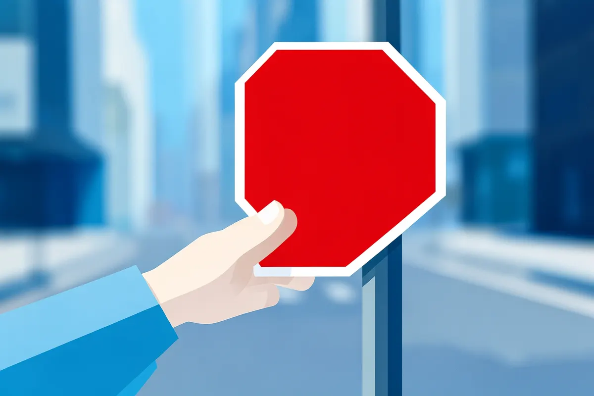 Person looking at a red stop sign.