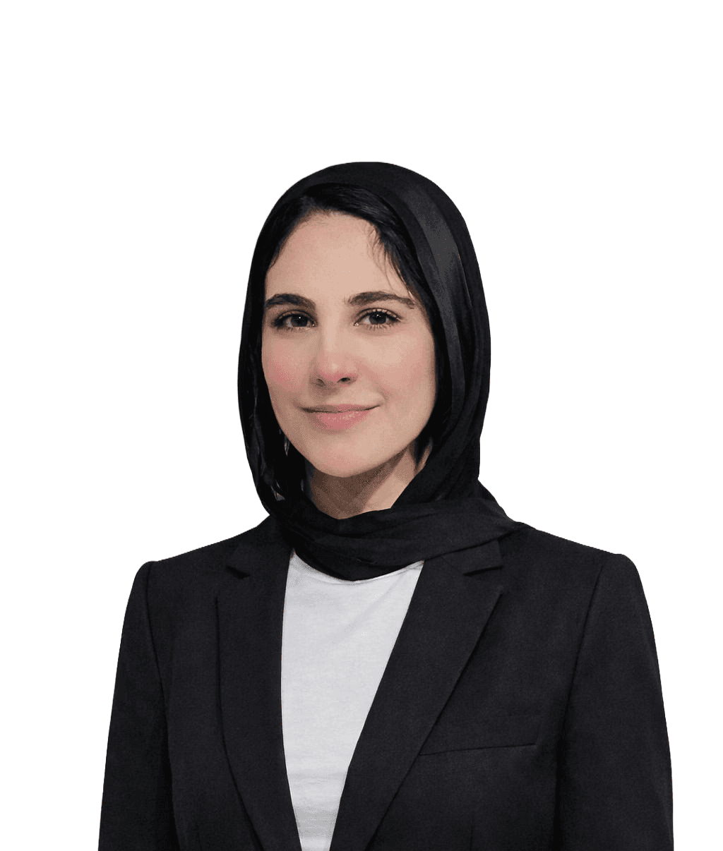 a woman with long brown hair smiling at the camera