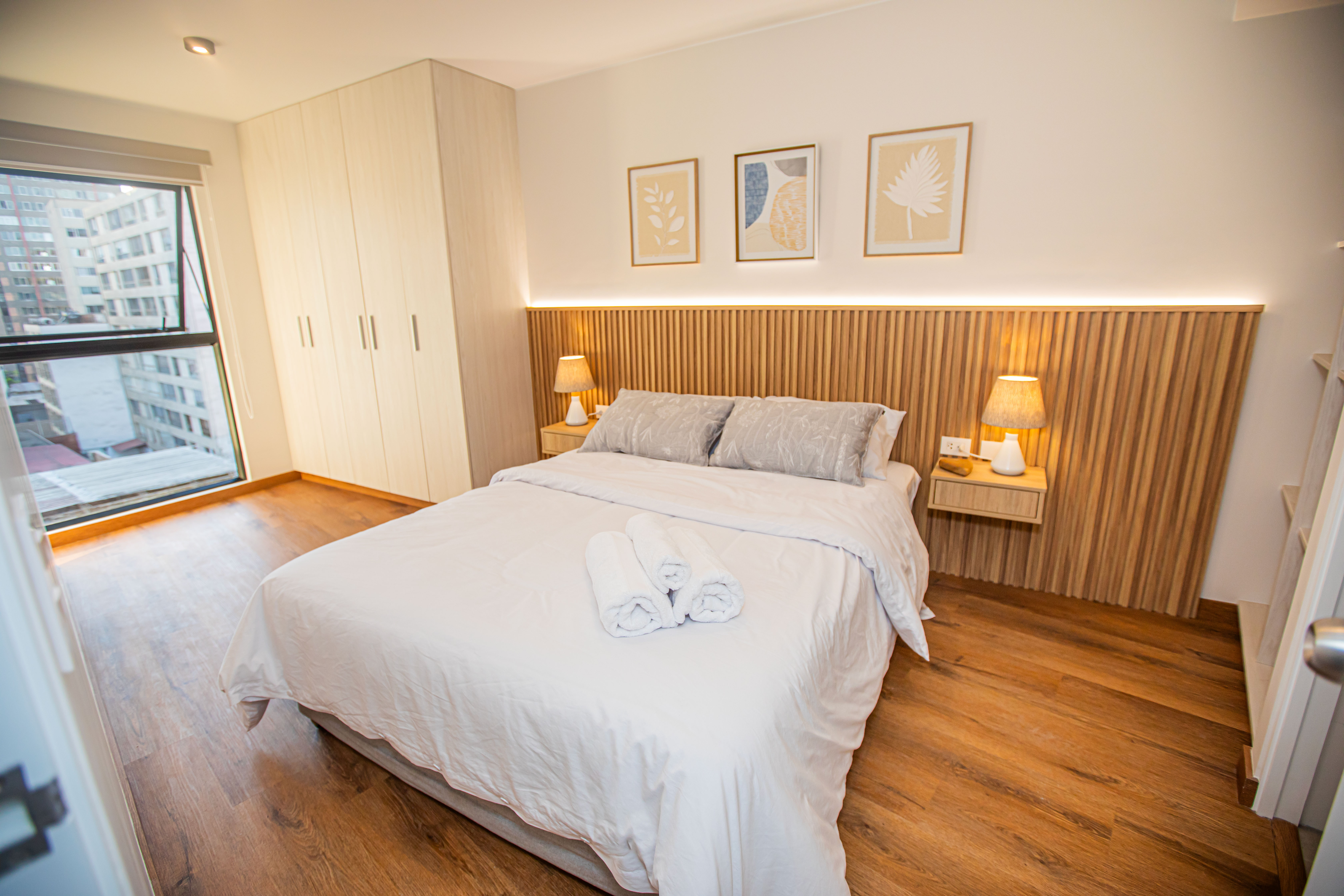 A man standing in front of home