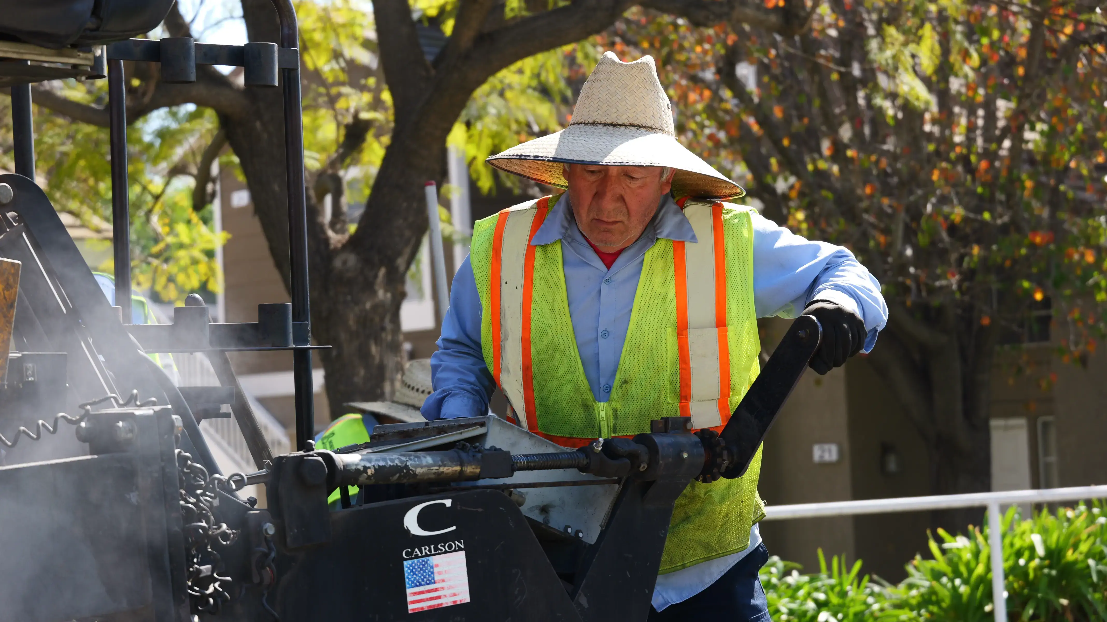Equipment operator on asphalt project