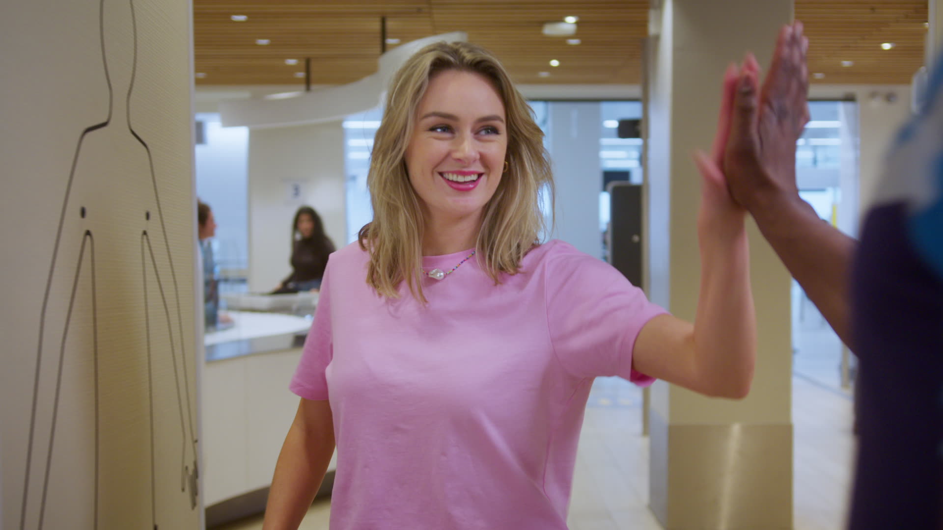 The image captures the ethereal beauty of an underwater cave illuminated by sunbeams penetrating through an opening above.