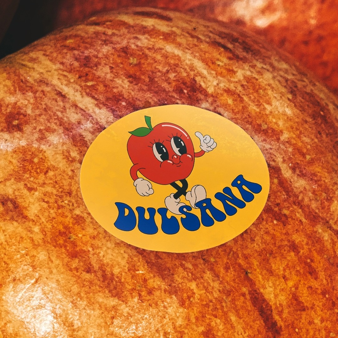 Sticker on an Apple