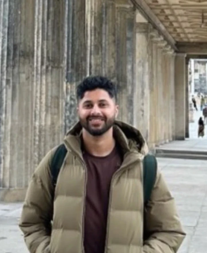 Couple hiking on a sunny trail