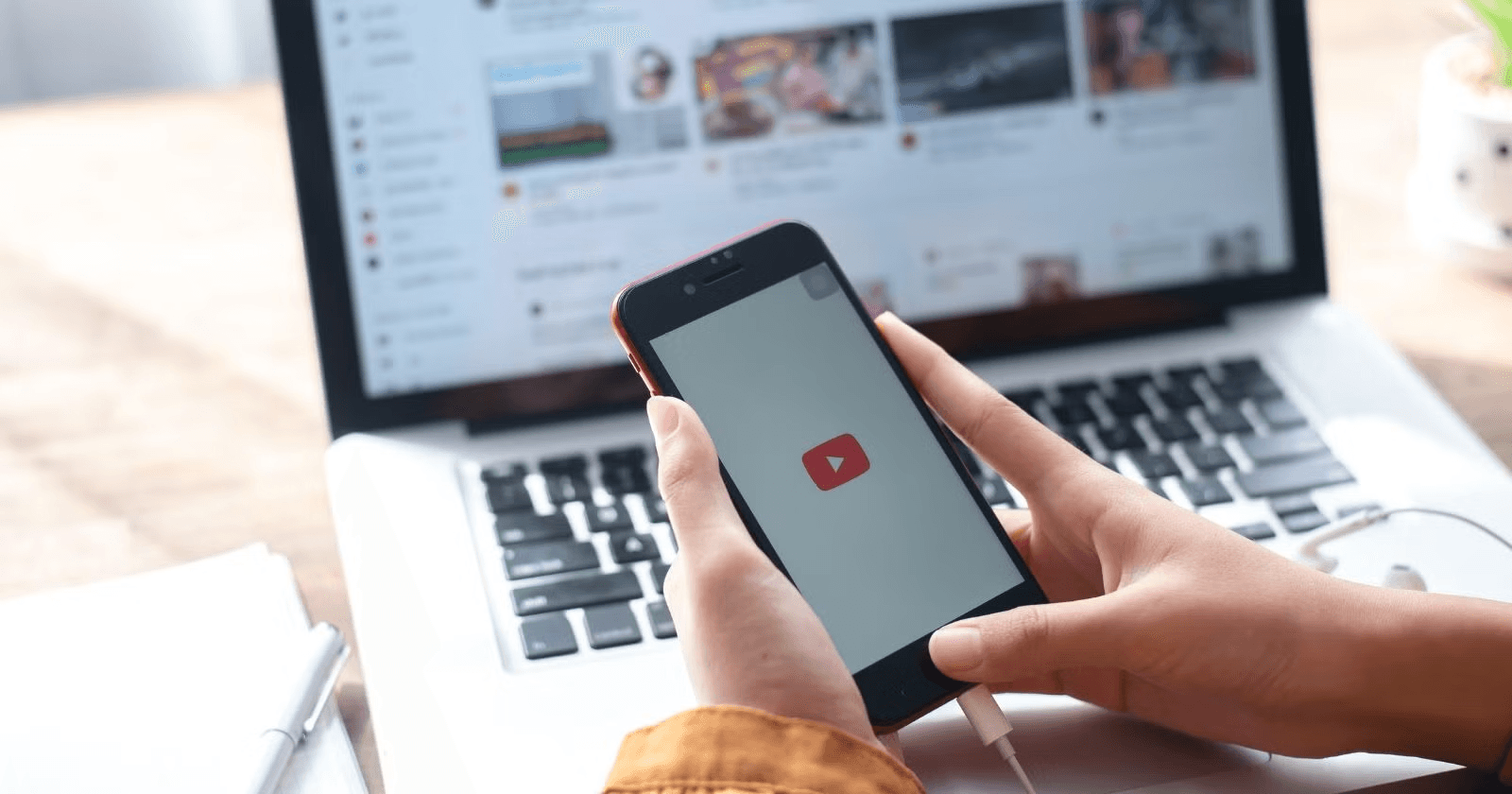 Person using youtube on multiple devices -  Best YouTube Video Summarizer