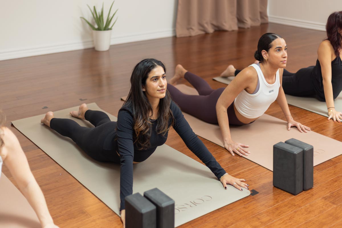 a group Hot Restorative class, Hot Yoga class in west-end Toronto