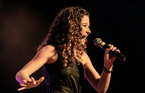 Live singer on an intimate stage