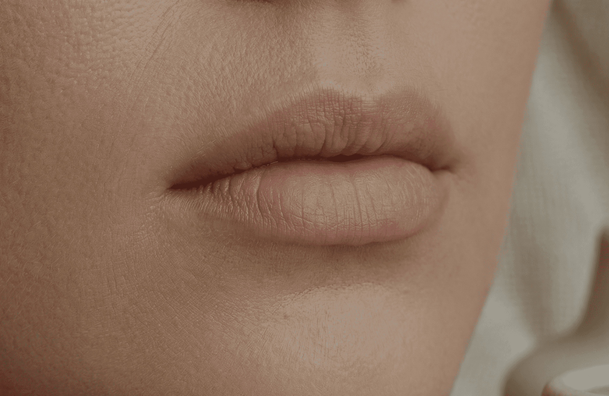 Woman undergoing VISIA Skin Analysis with advanced imaging device that captures high-resolution facial scans to evaluate skin texture, pigmentation, and underlying concerns.