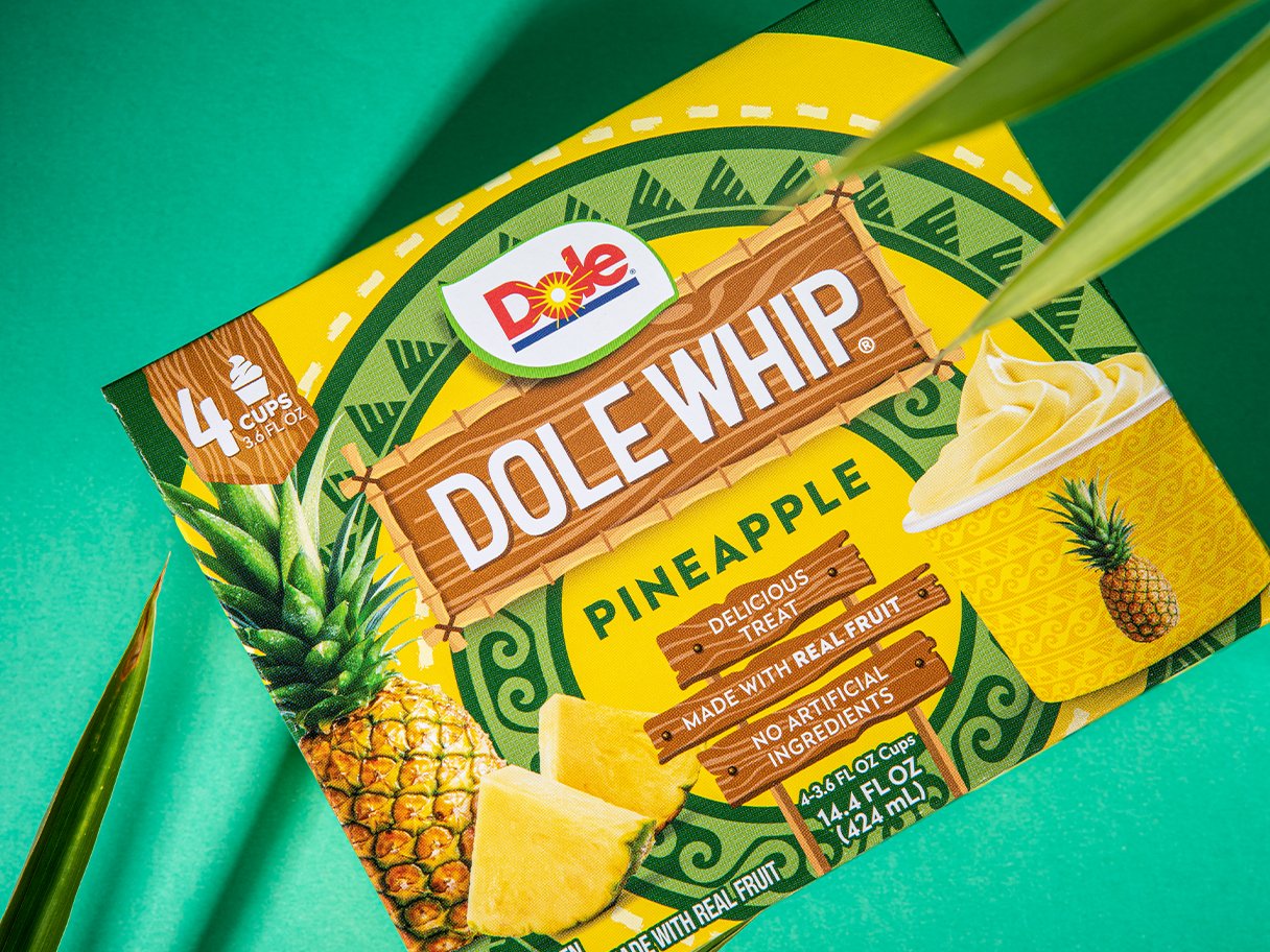 Rooftops of a coastal town with the sea in background