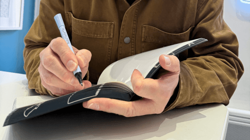 A brand new Neuland notebook being written in for the first time