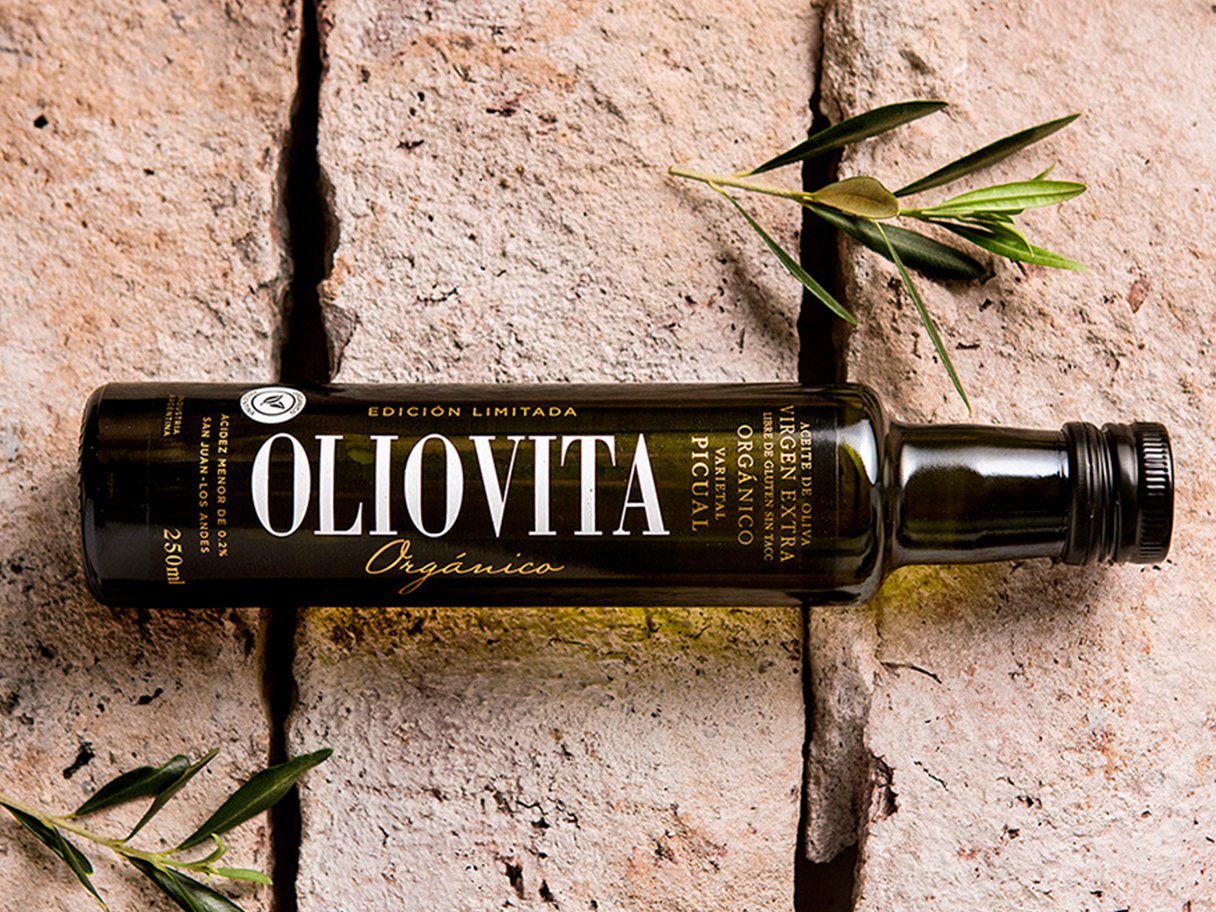 Rooftops of a coastal town with the sea in background