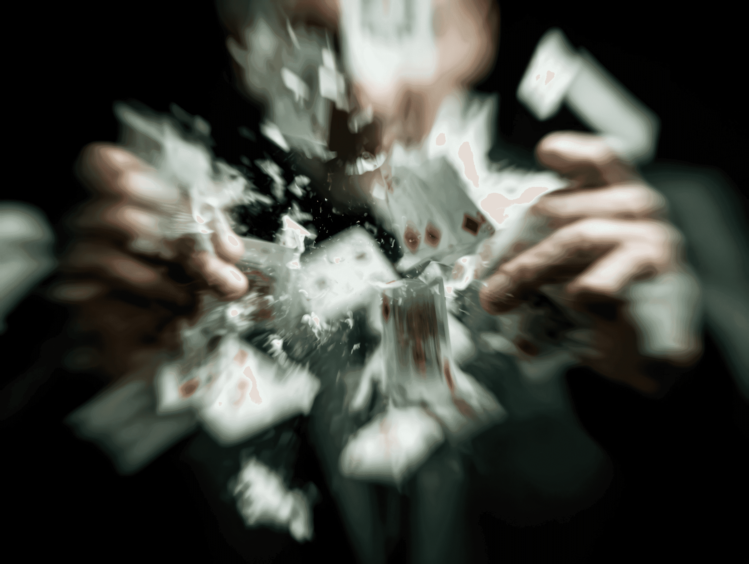 Hands scattering multiple banknotes in dramatic motion blur