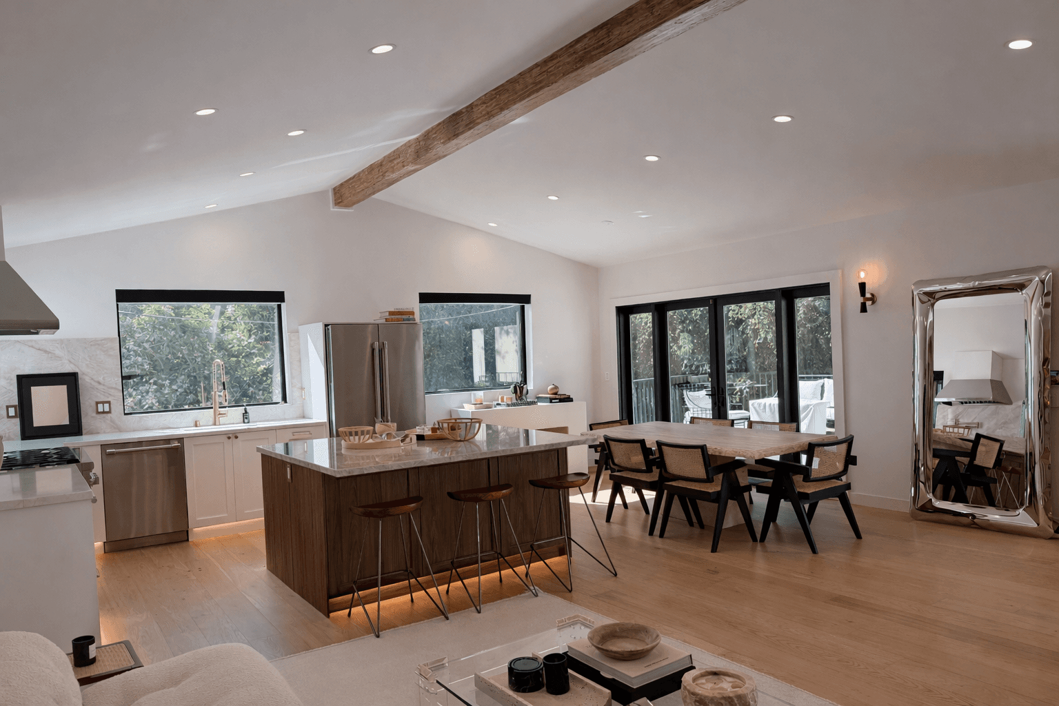 Bright bedroom with colorful bedspread and wall art