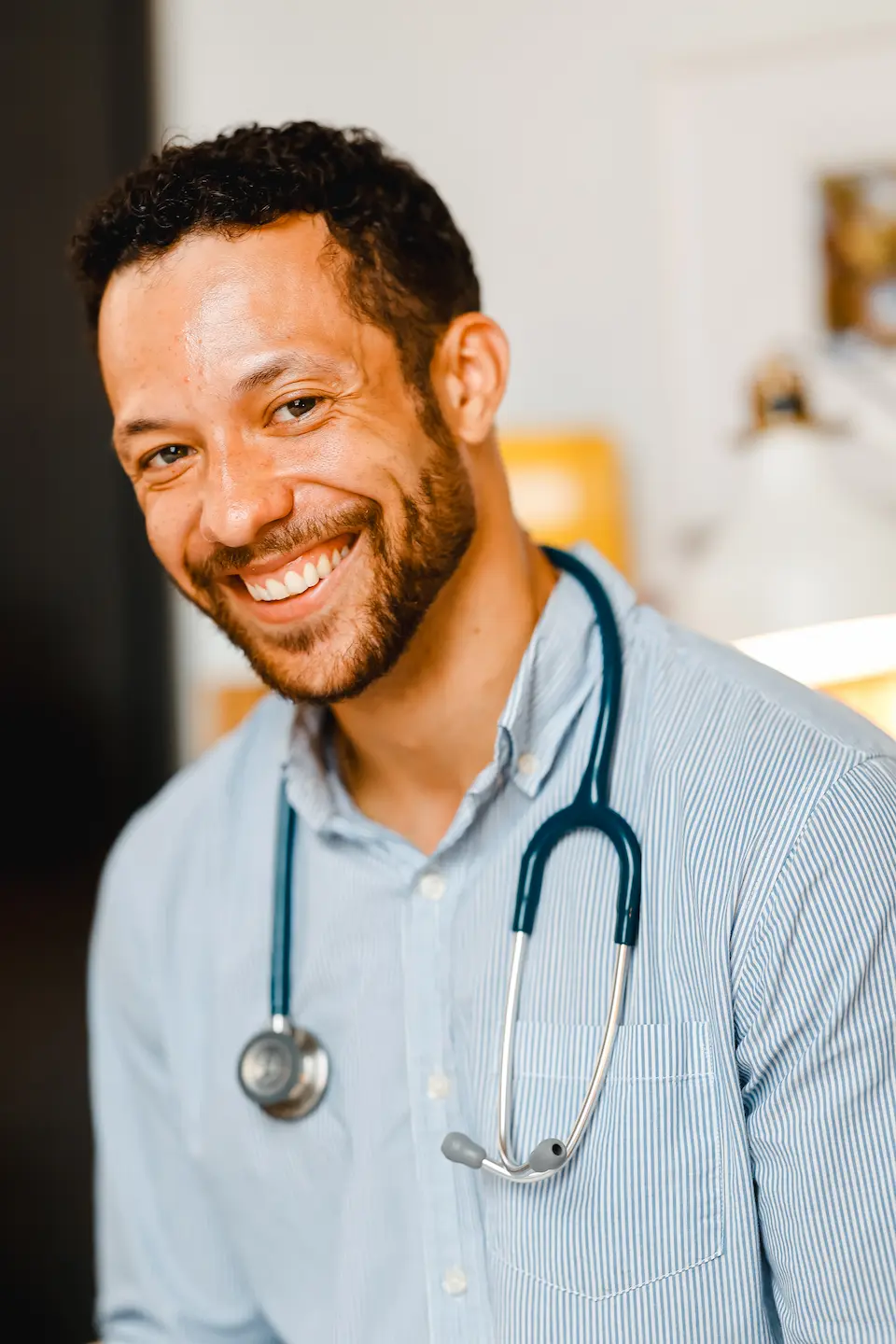 Chris Jardine, Naturopathic Doctor, smiling in a clinical setting