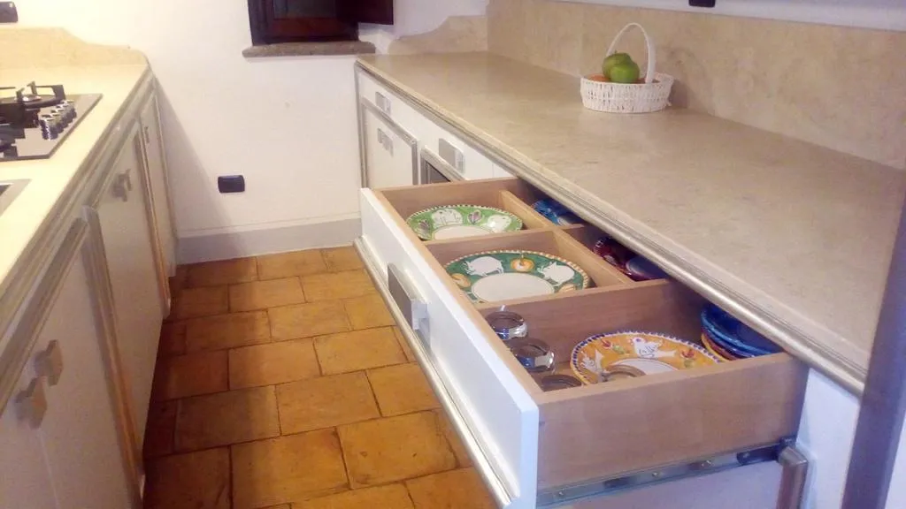 a wood box with a metal handle