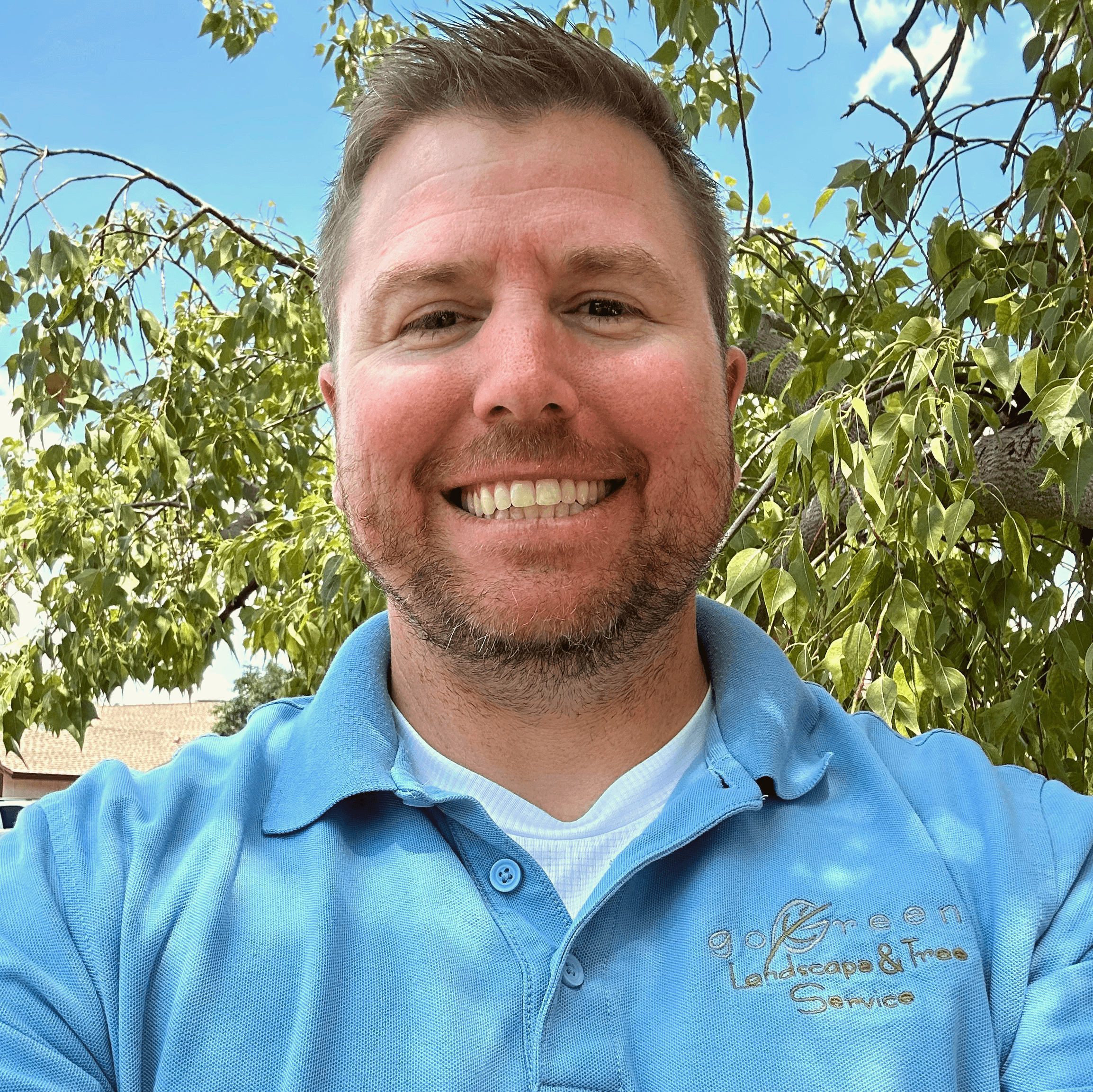 man standing beside wall