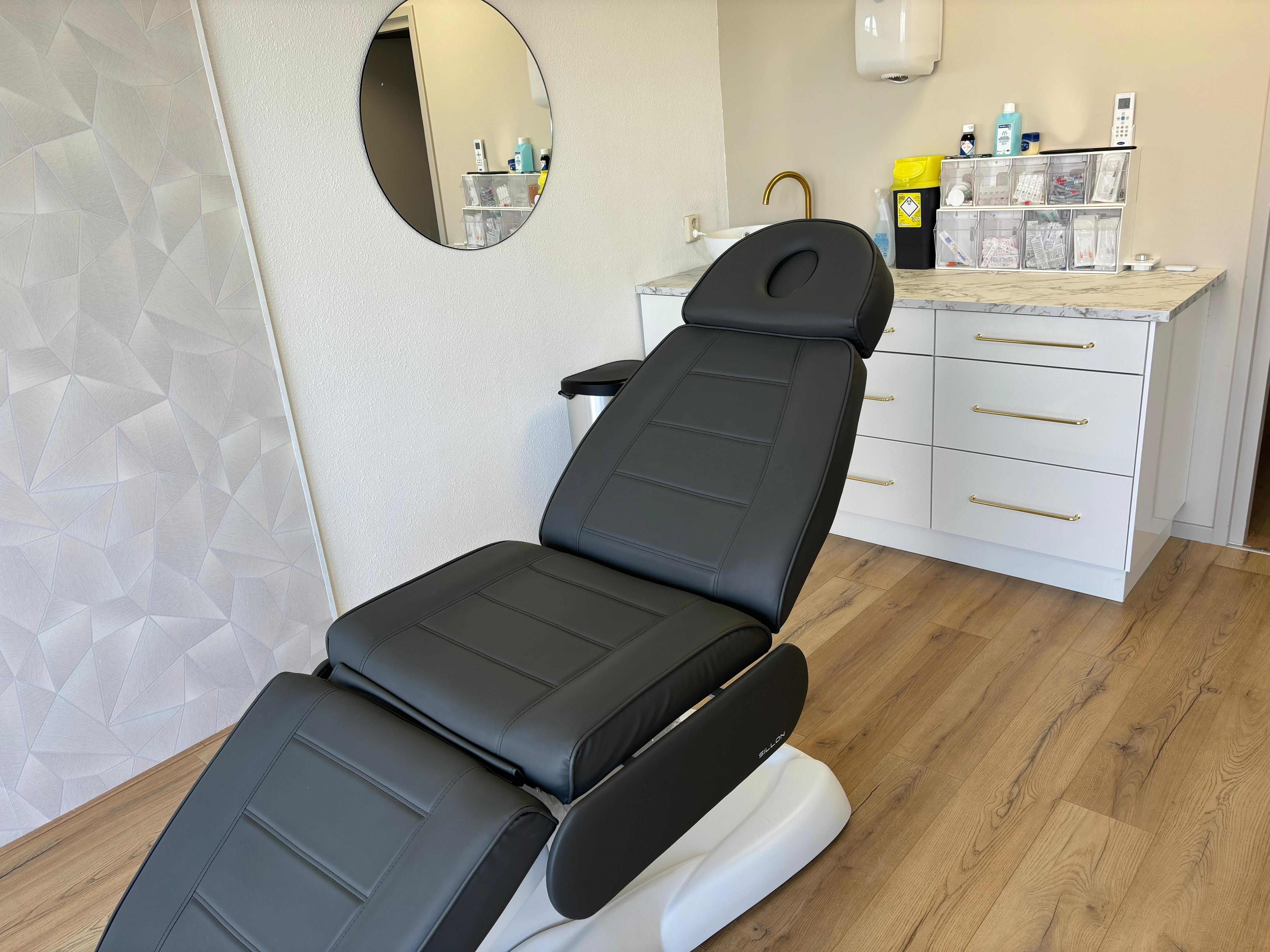 Woman receiving cosmetic skin treatment