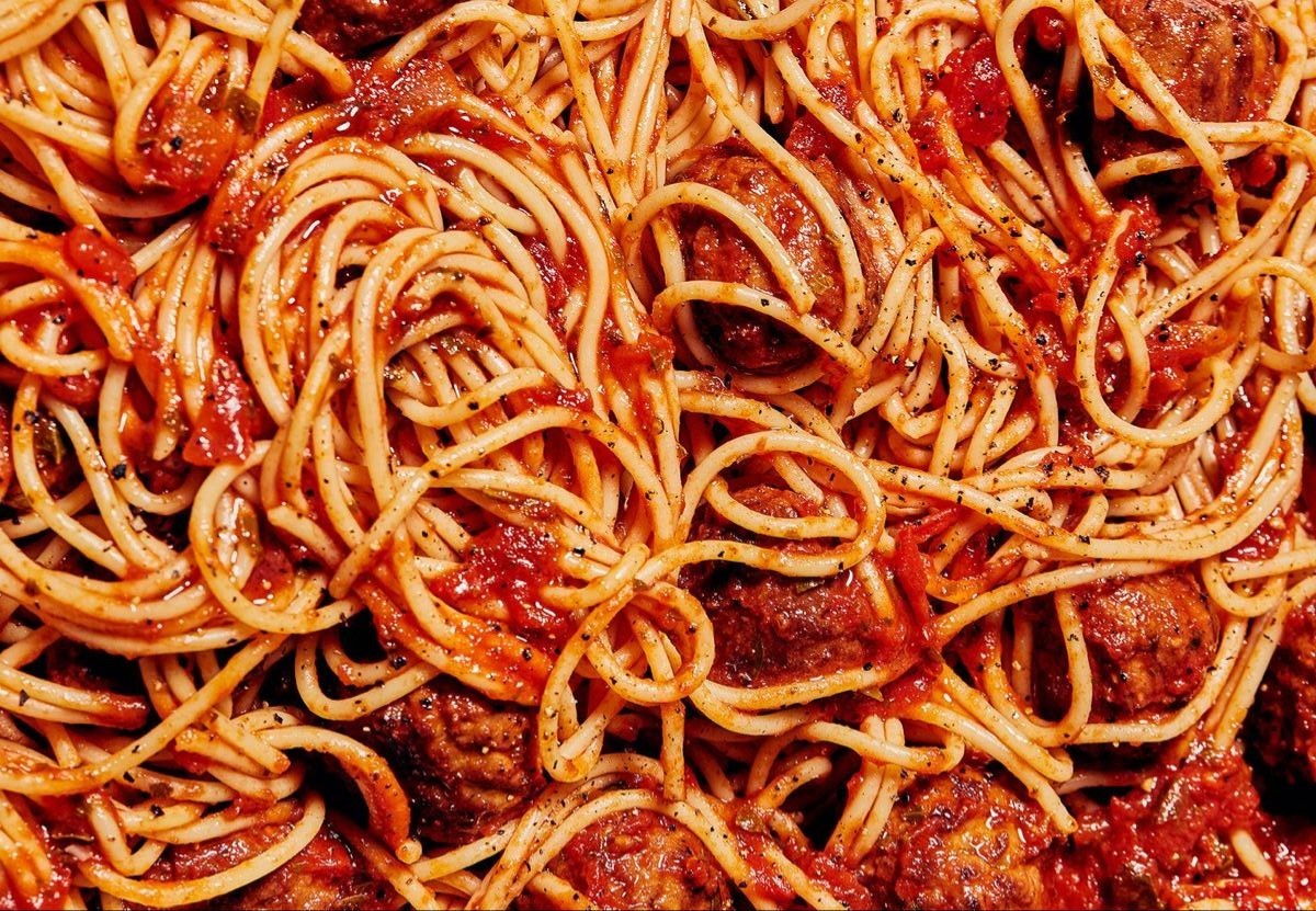 Rich red sauce pasta from PASTA 9 Toronto, coated in spicy tomato and herbs, representing the bold flavors of Italian comfort cuisine.