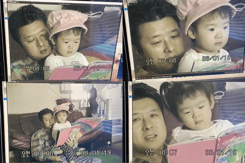 a blurry photo of a person standing in front of a wall